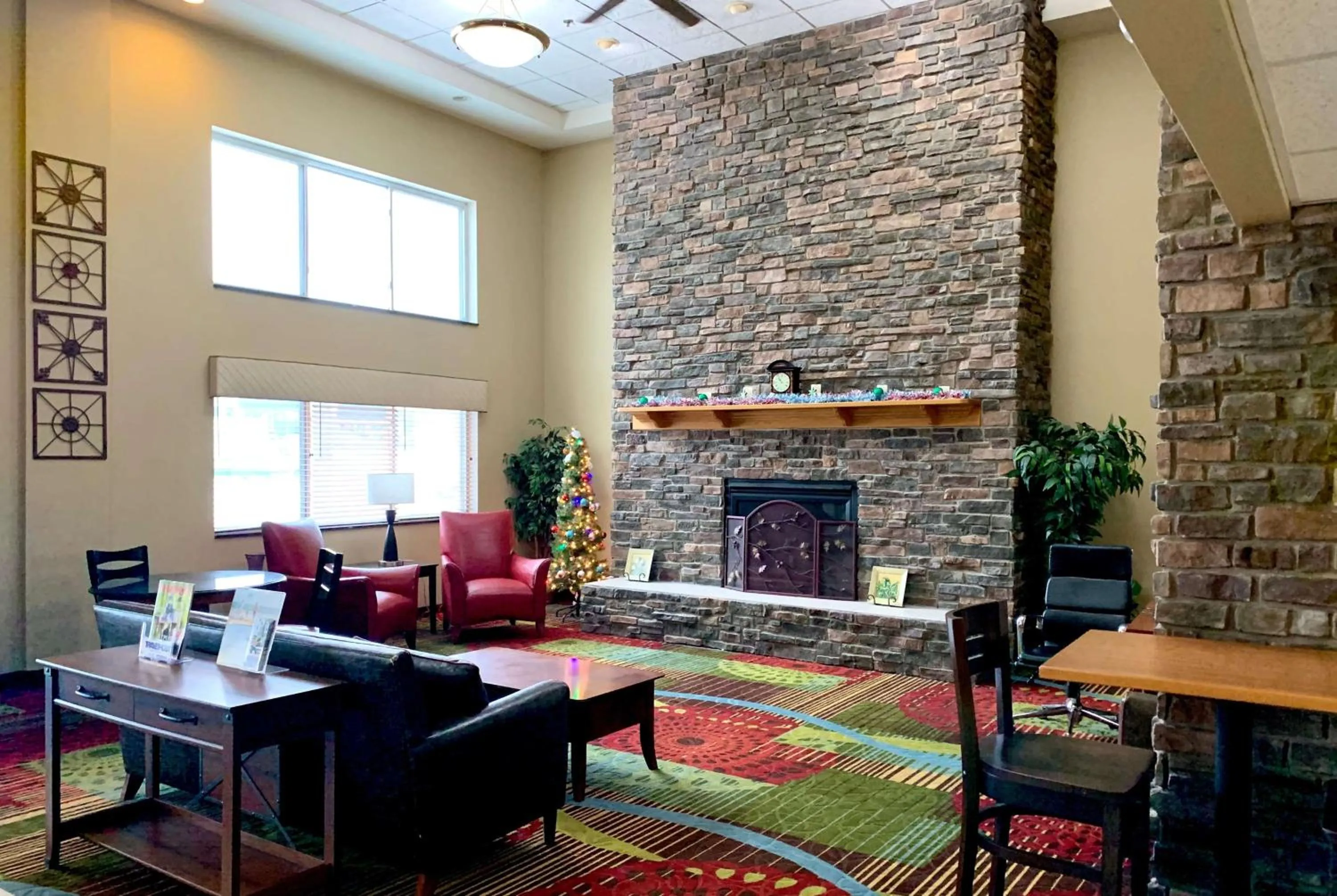 Lobby or reception in AmericInn by Wyndham Wausau