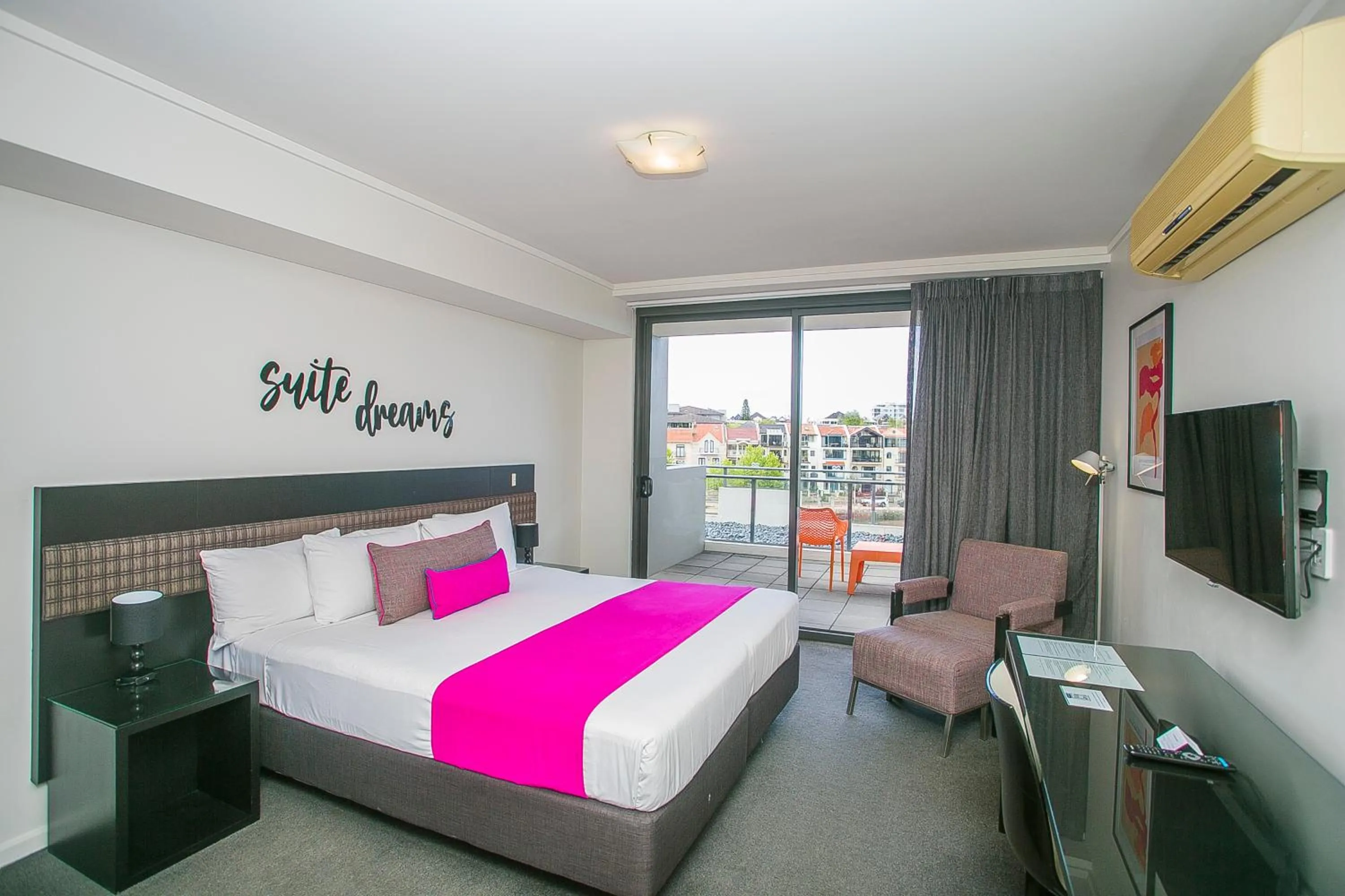 Bed in East Perth Suites Hotel