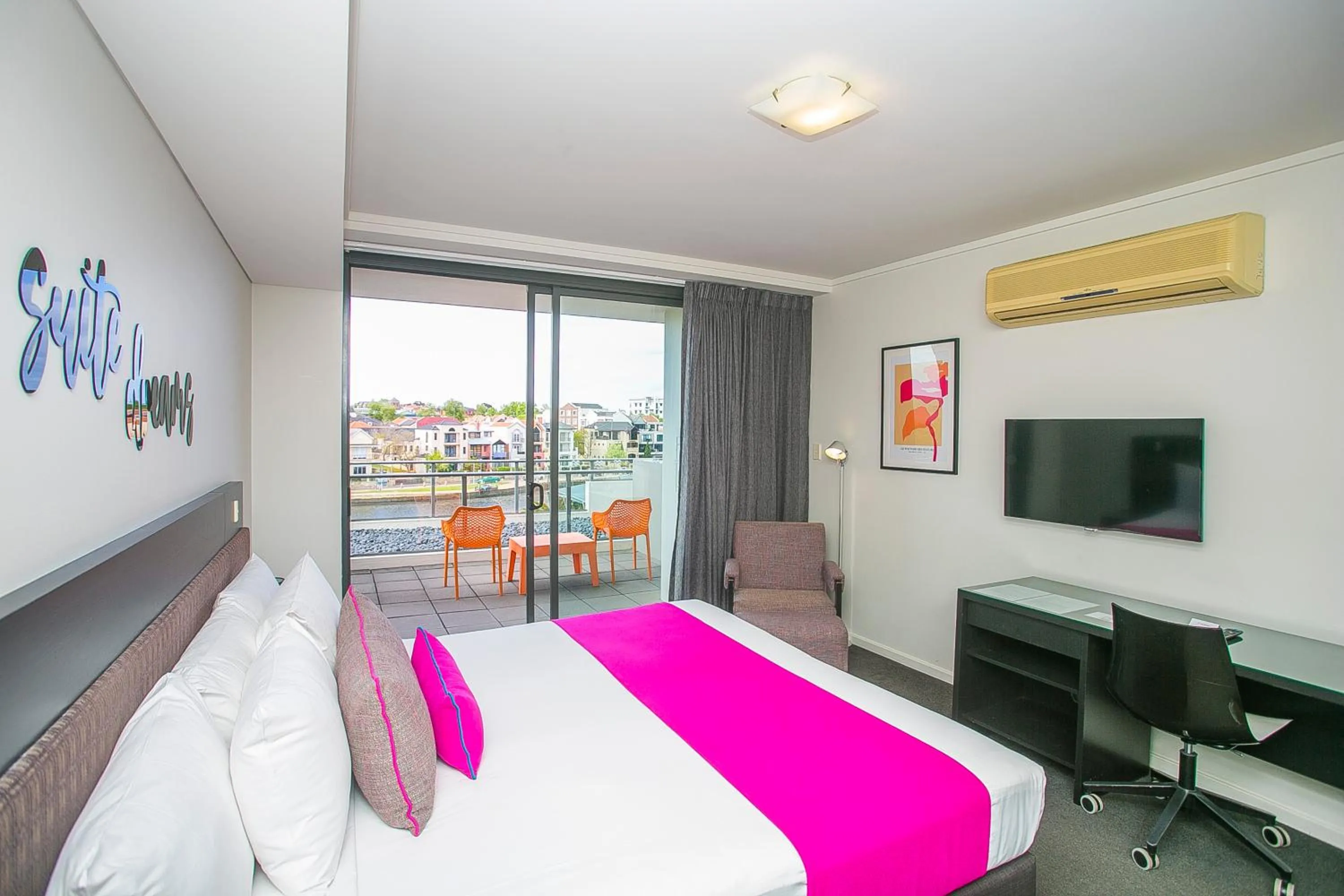 Bed in East Perth Suites Hotel
