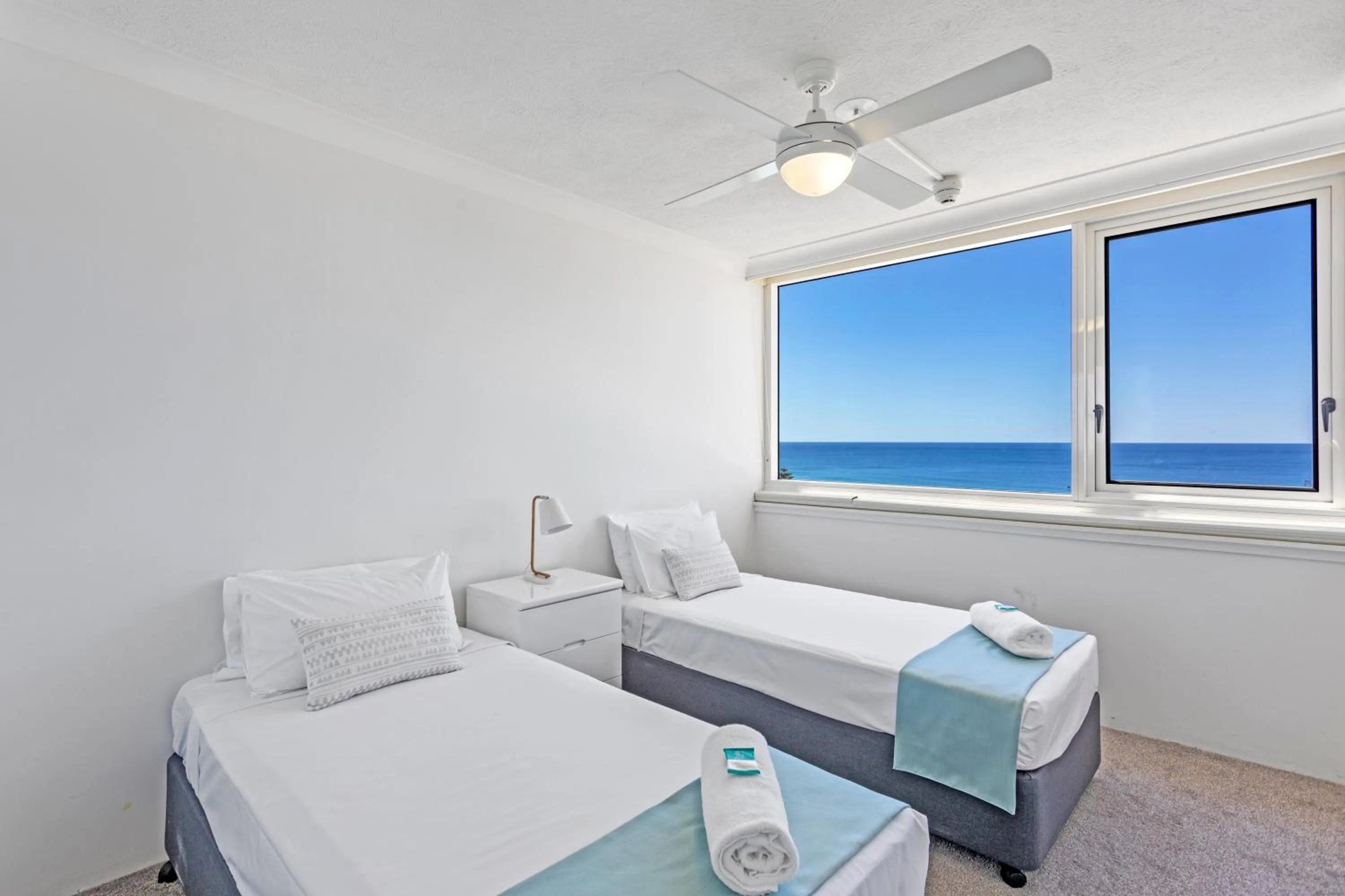 Bed in Southern Cross Beachfront Holiday Apartments