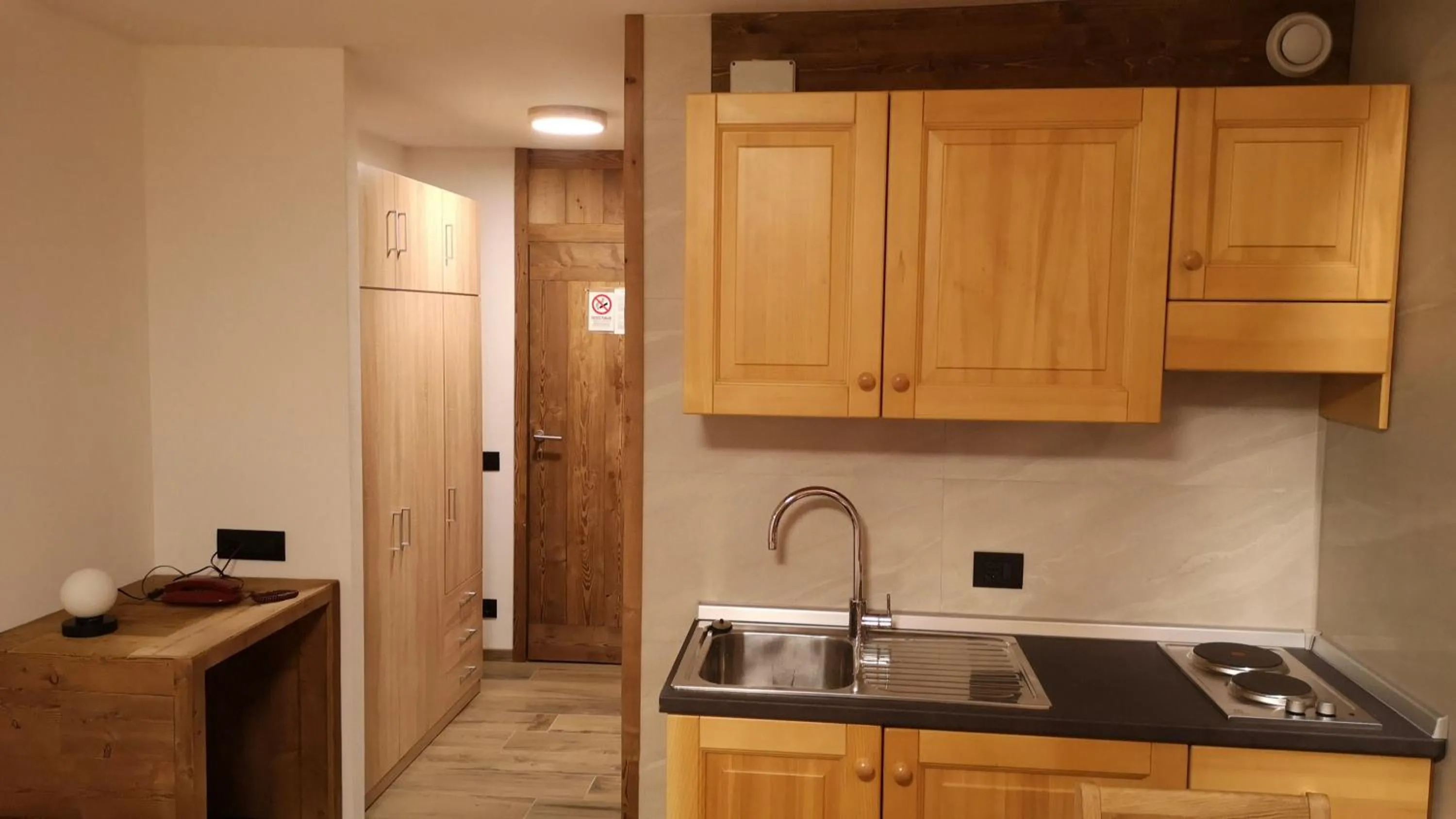 Kitchen or kitchenette in Residence Petit Tibet