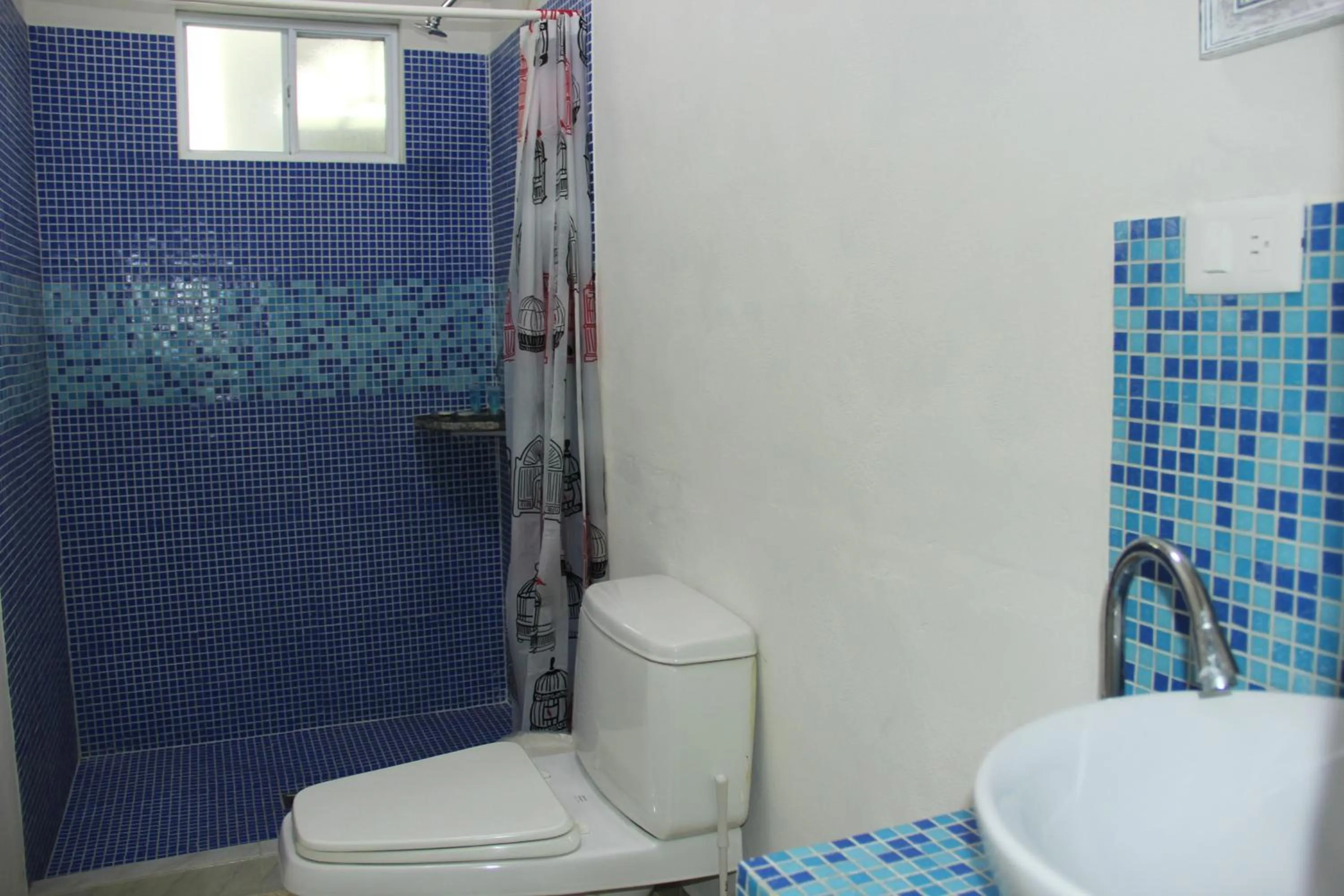 Bathroom in Cancun Blue Airport