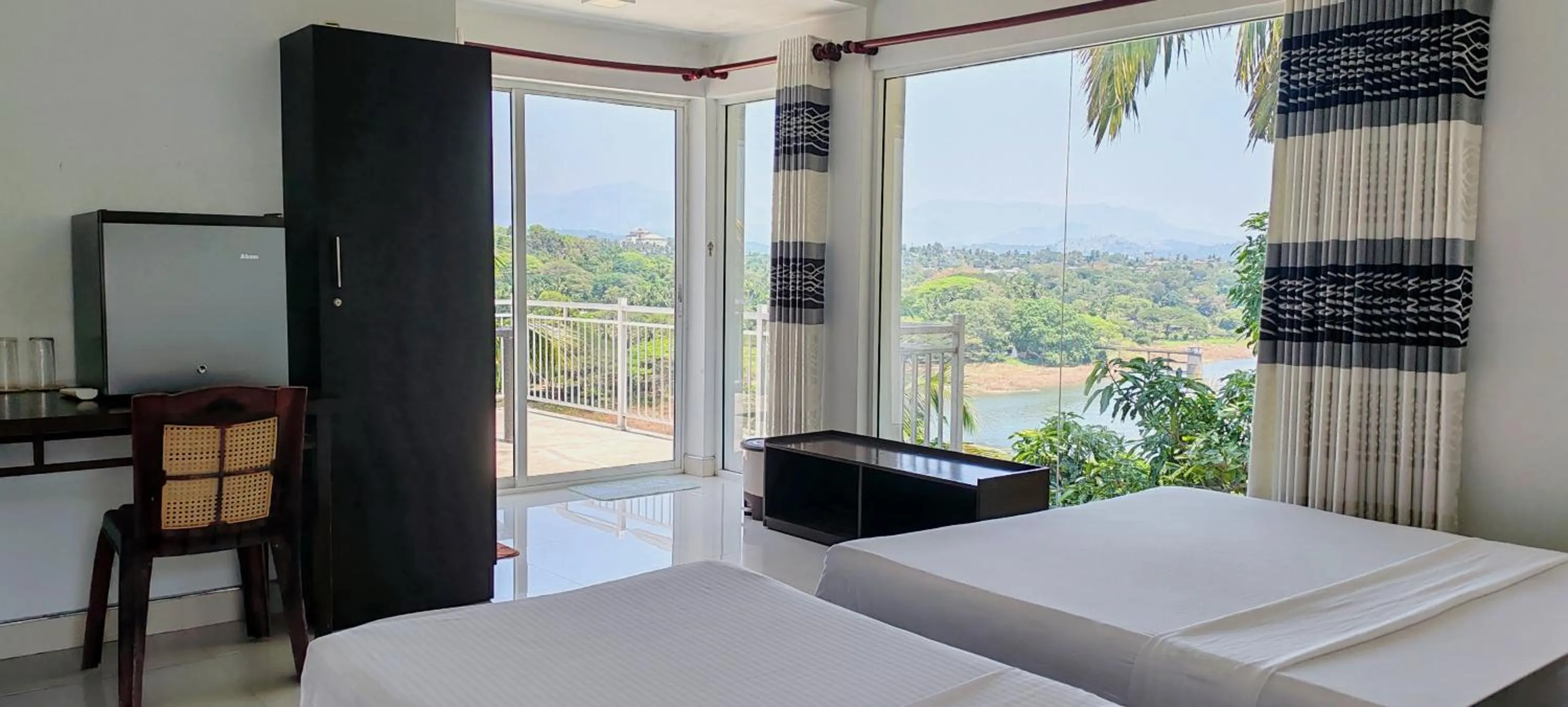 View (from property/room), Bed in Mahaweli View Inn Kandy