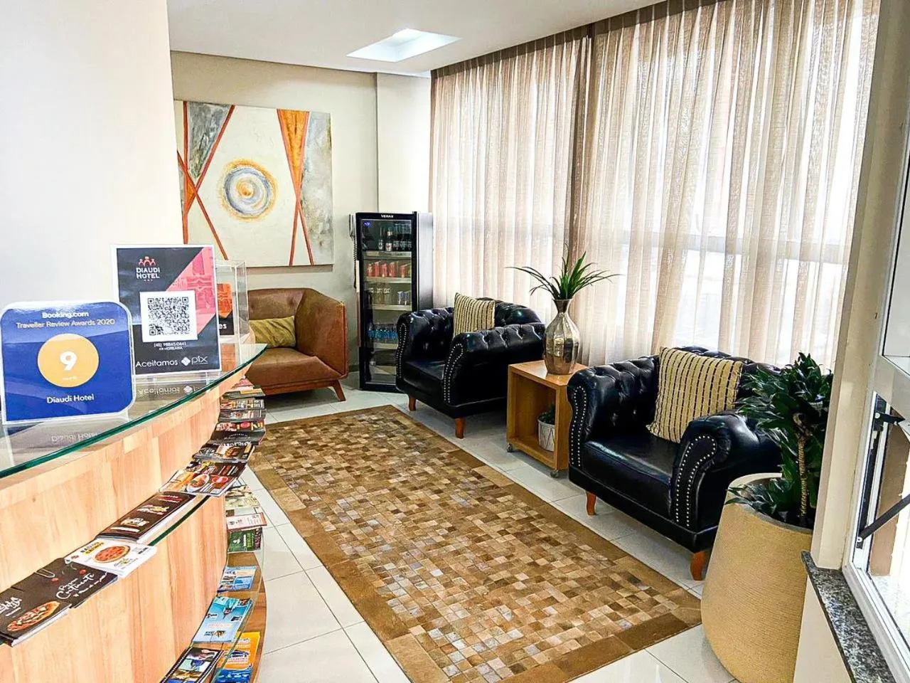 Lobby or reception in Diaudi Hotel