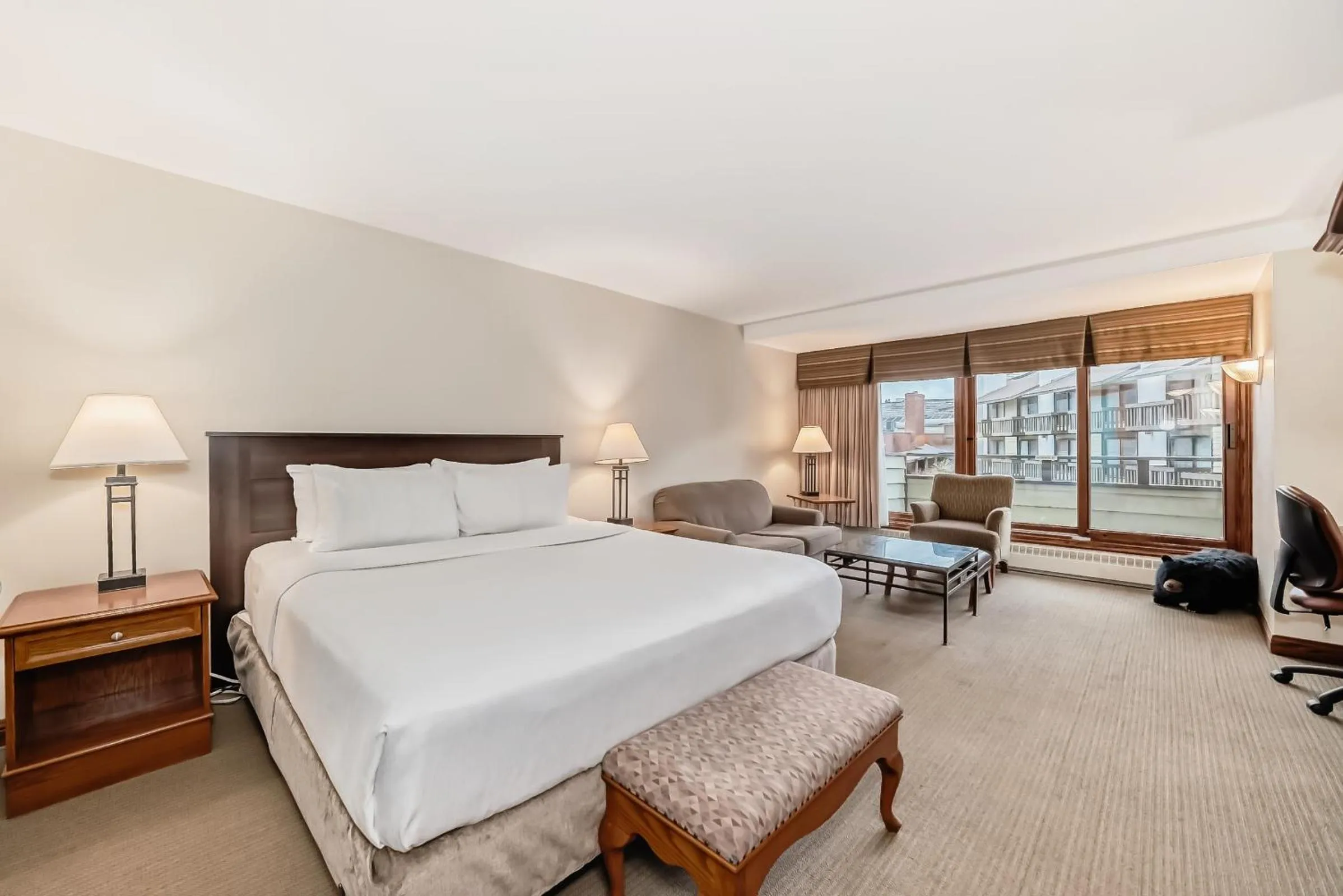 Bed in Jasper Inn & Suites by INNhotels