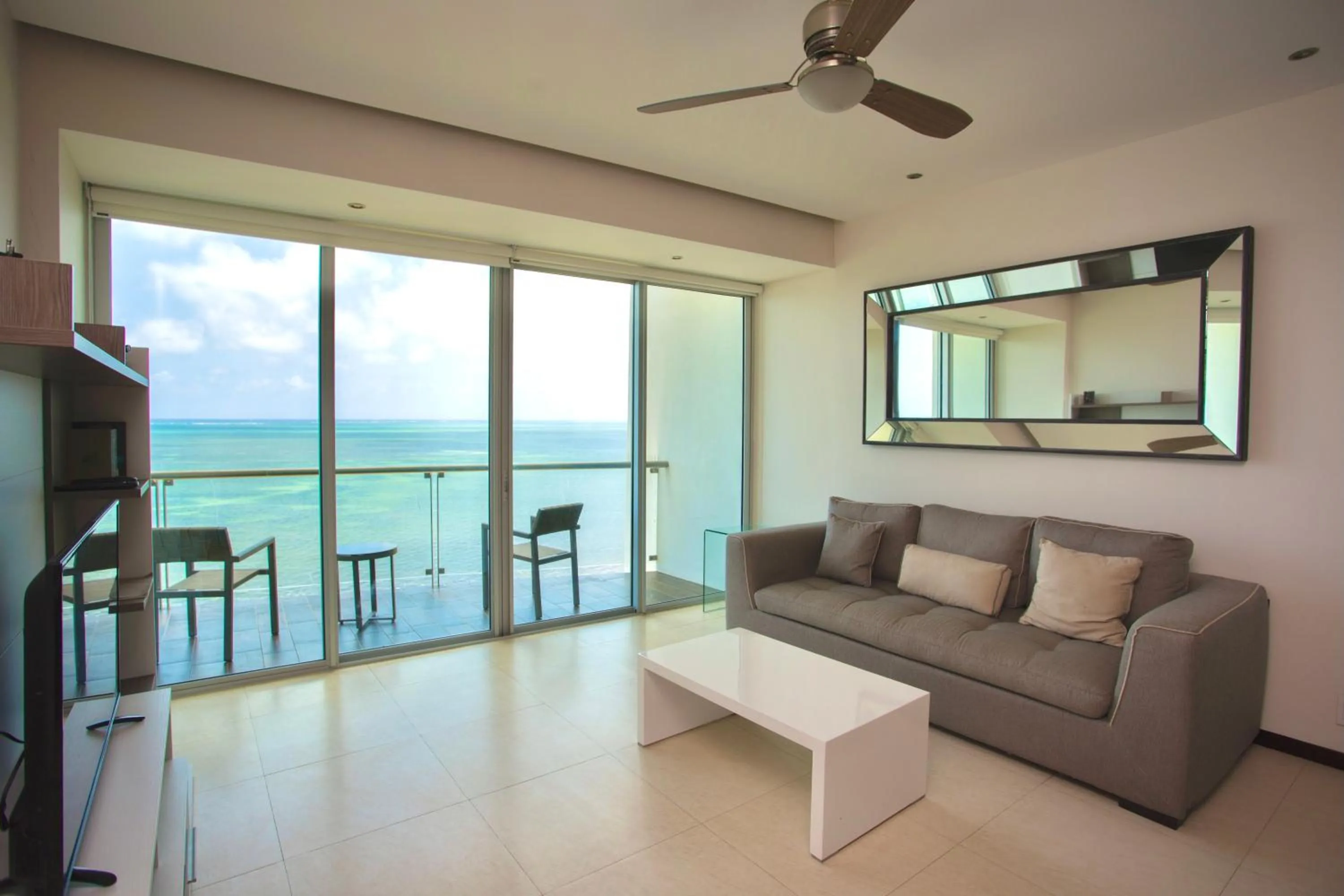 Living room in Apartment on the beach! Infinity pool
