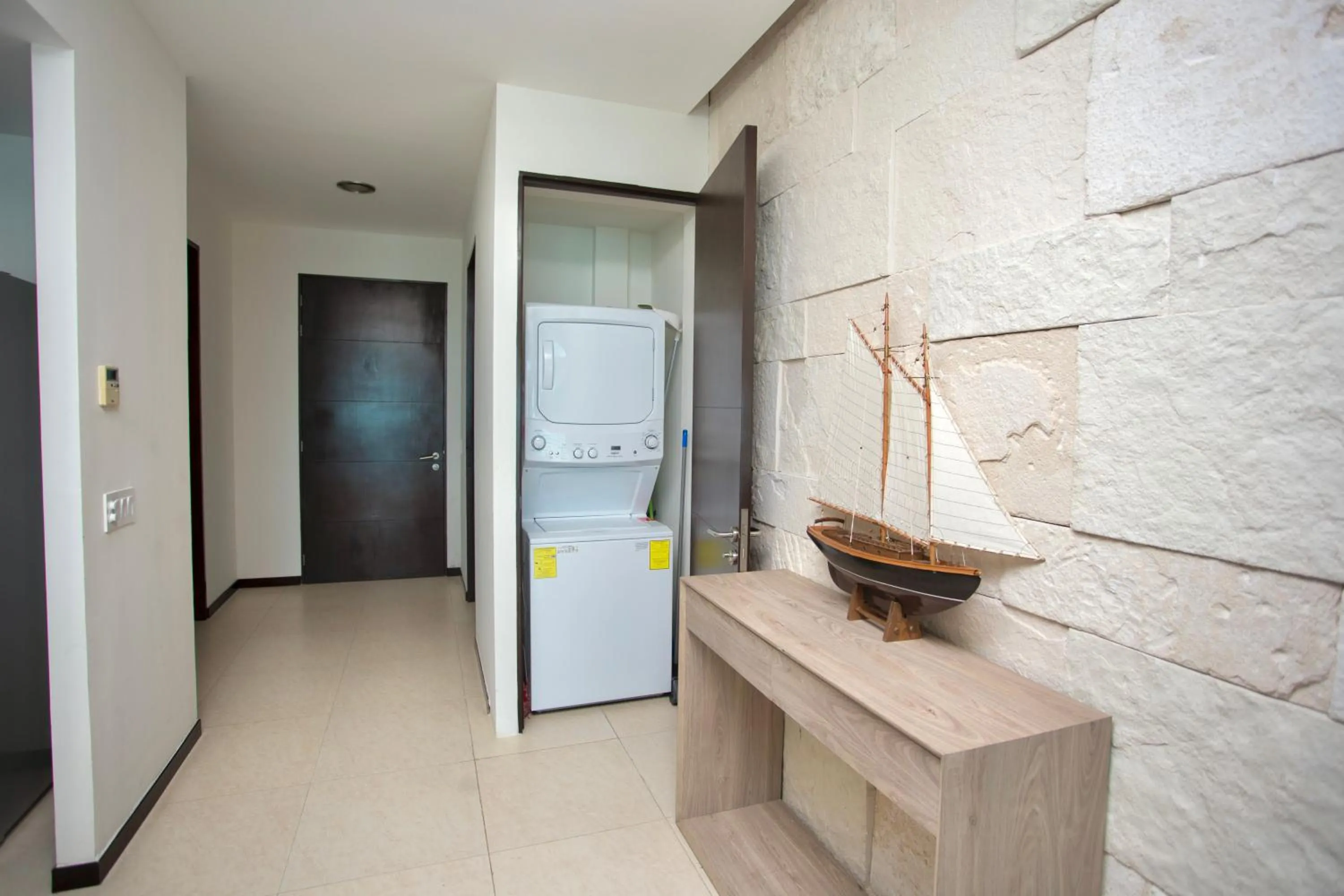 washing machine in Apartment on the beach! Infinity pool