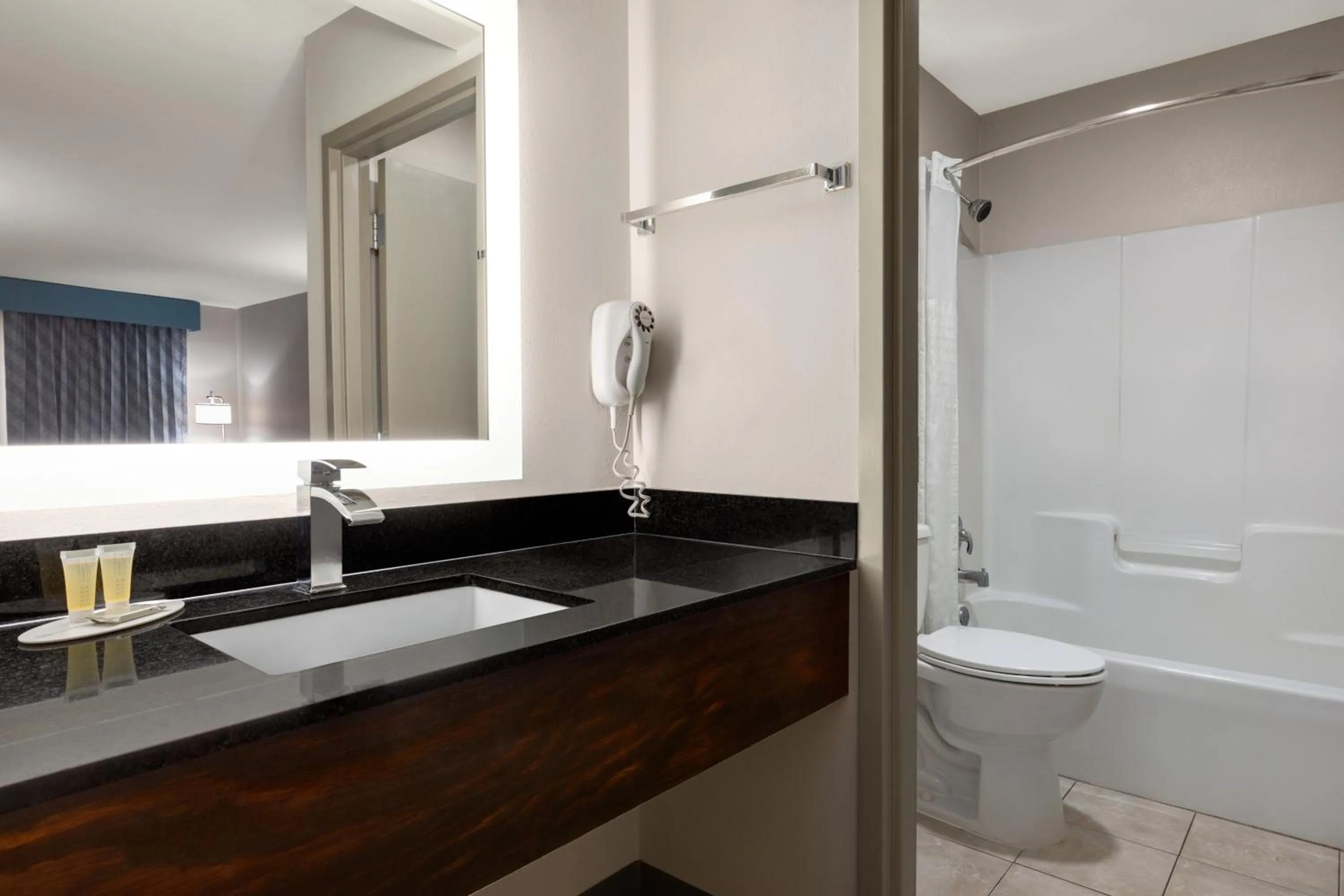 Bathroom in Days Inn by Wyndham Covington