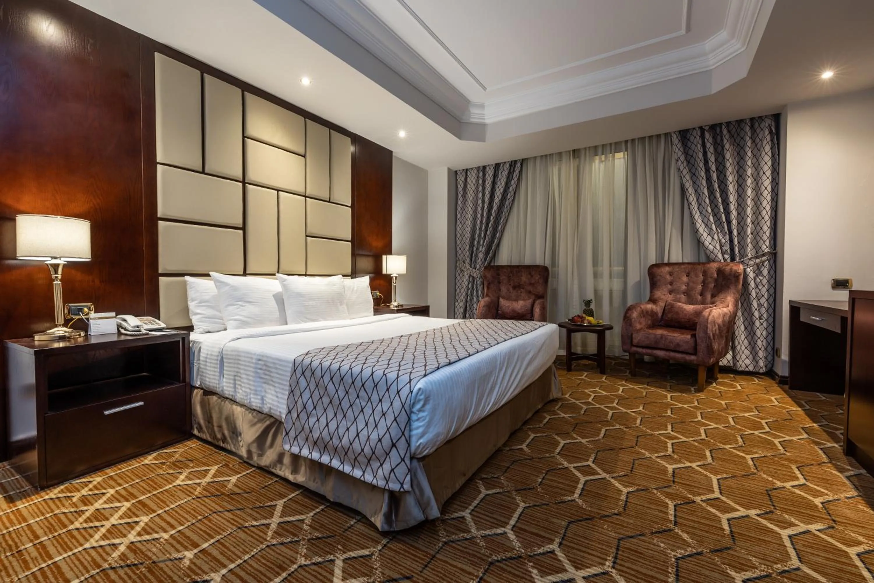 Bedroom, Bed in Triumph Plaza Hotel