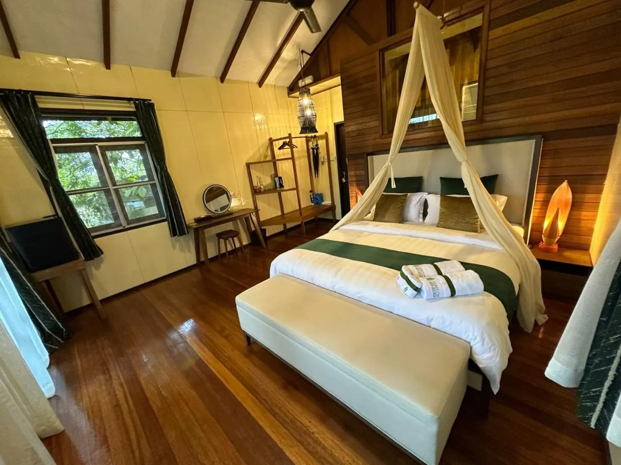 Bed in Sepilok Forest Edge Resort