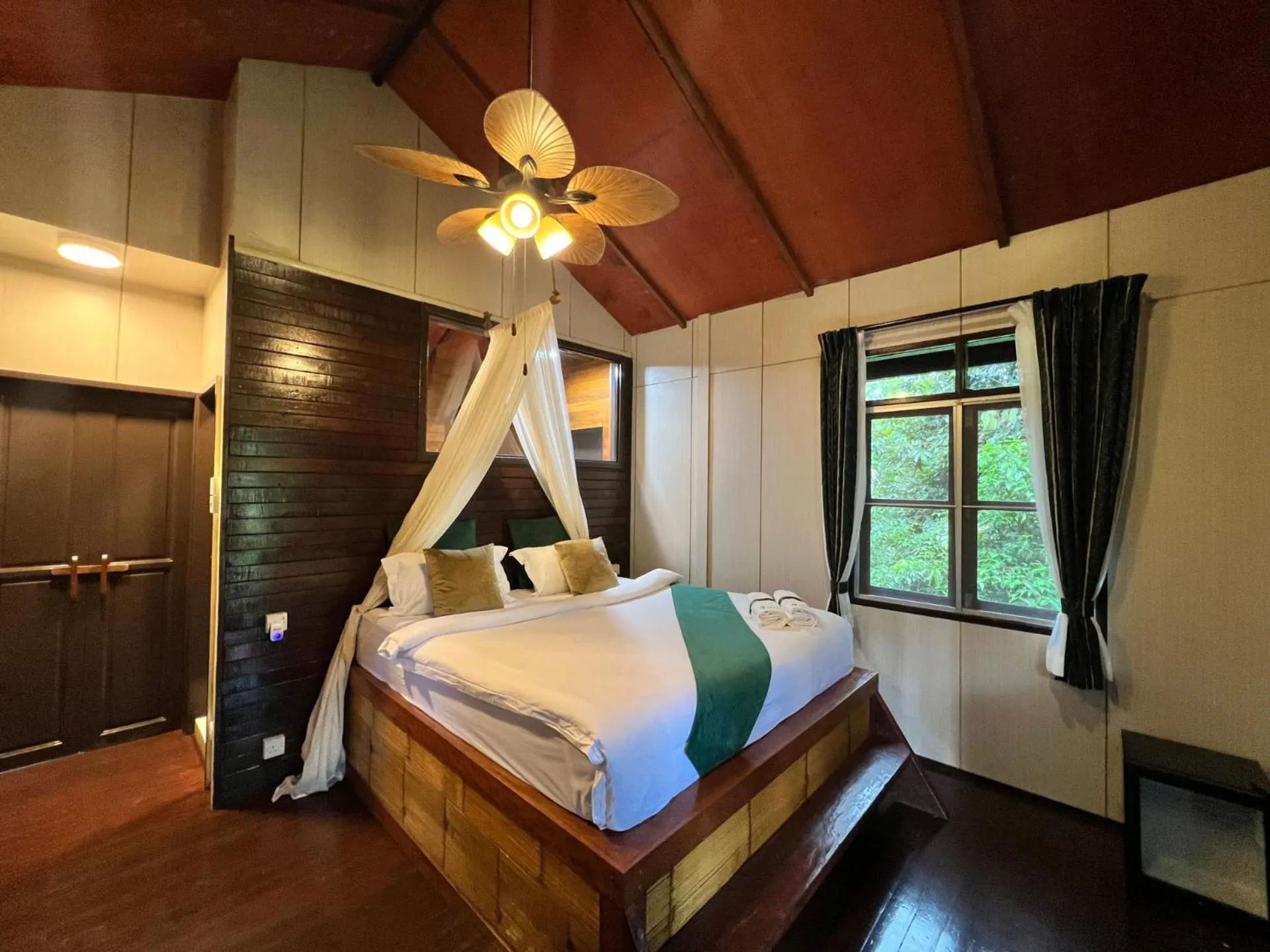 Bed in Sepilok Forest Edge Resort