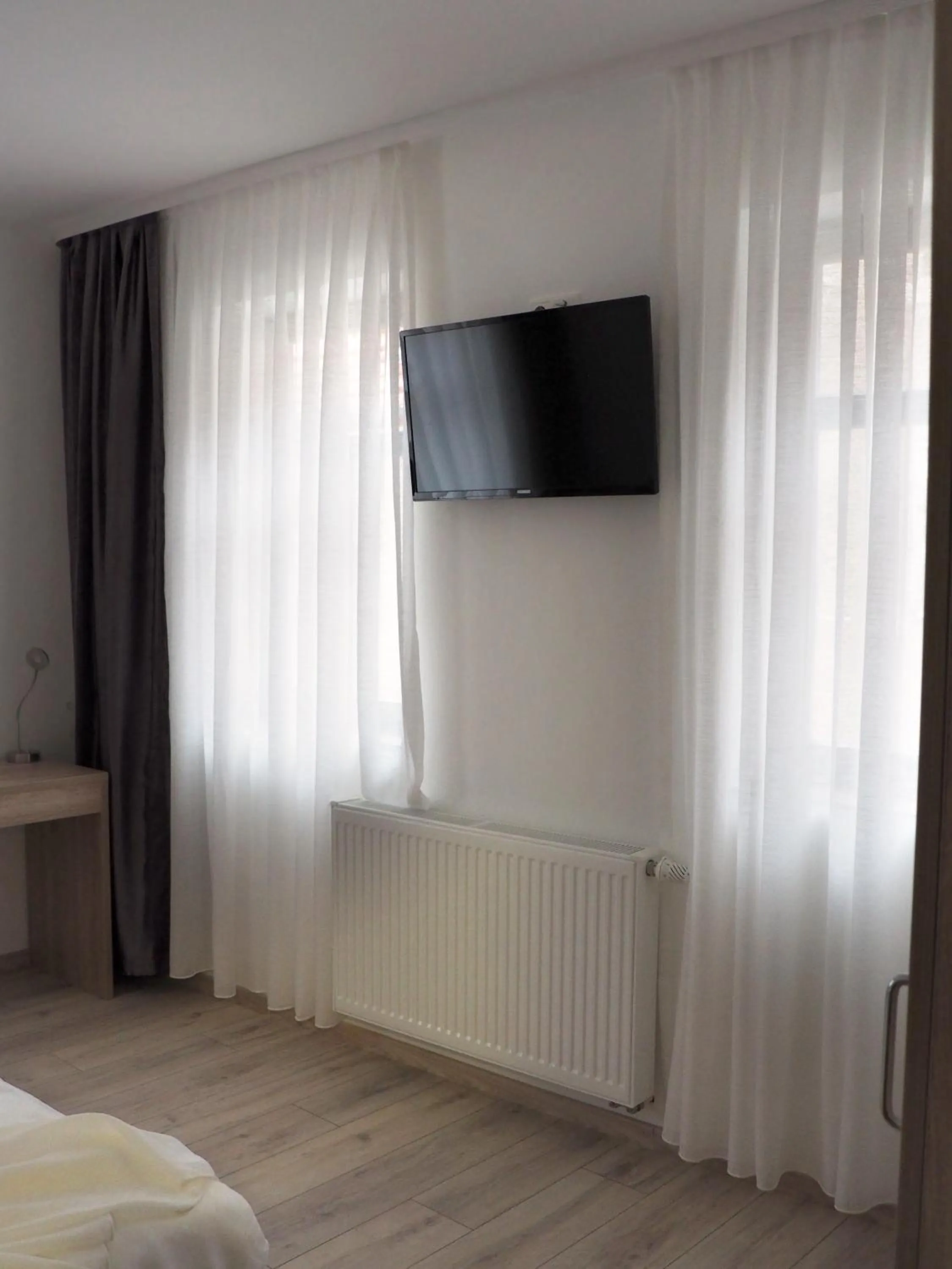 Bed in Pension Villa Colosseo im Herzen von Meiningen