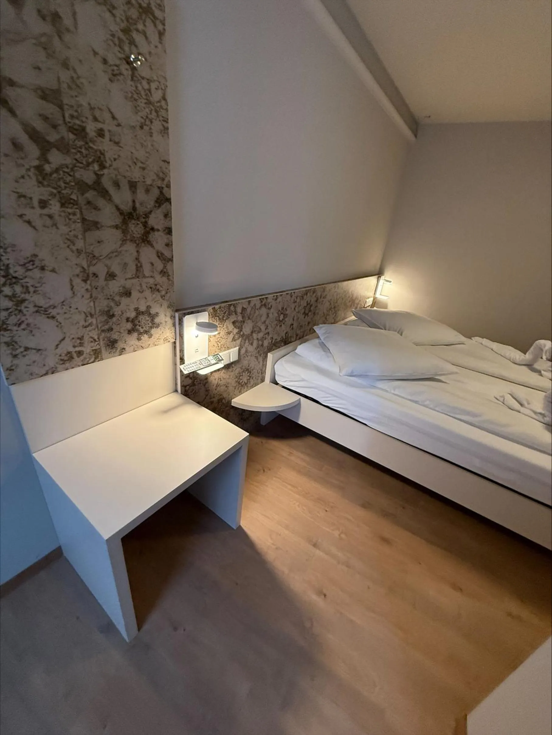 Bed in Pension Villa Colosseo im Herzen von Meiningen