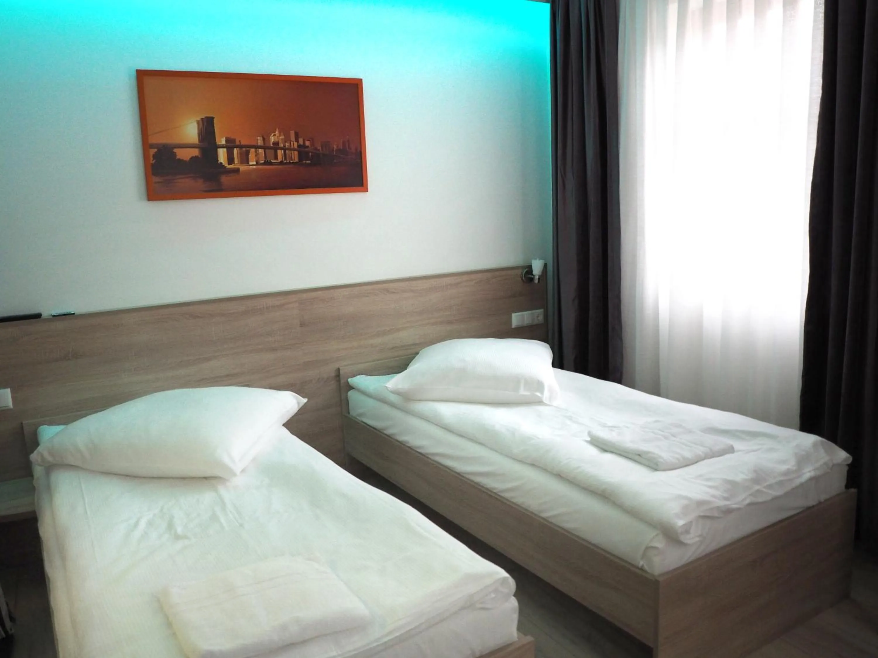 Bed in Pension Villa Colosseo im Herzen von Meiningen