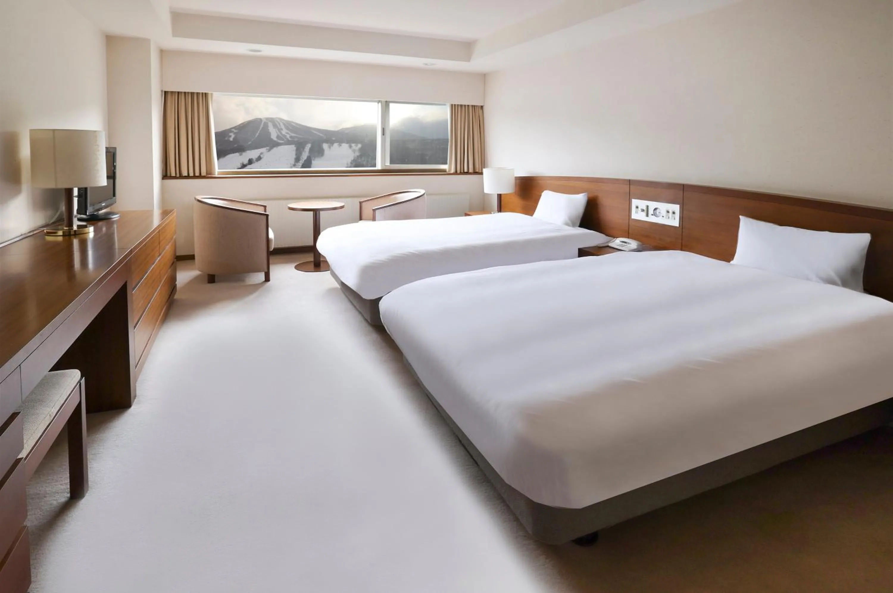 Photo of the whole room, Bed in ANA Crowne Plaza Resort Appi Kogen by IHG