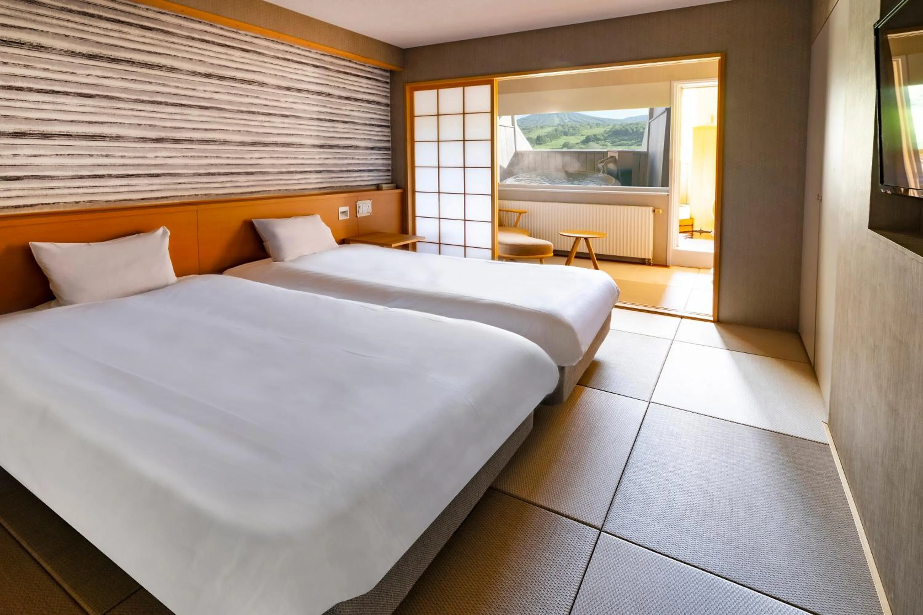 Photo of the whole room, Bed in ANA Crowne Plaza Resort Appi Kogen by IHG