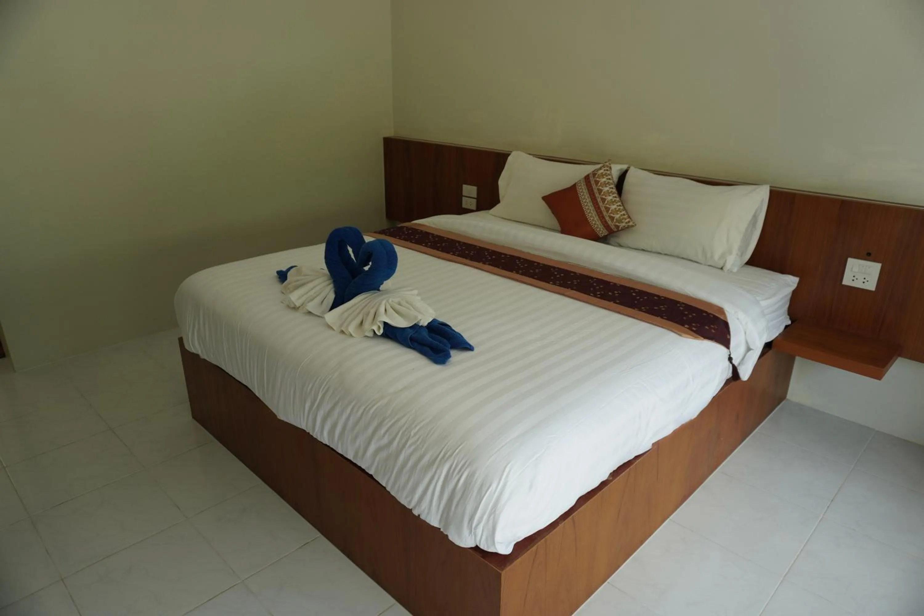 Bed in JP Resort Koh Tao