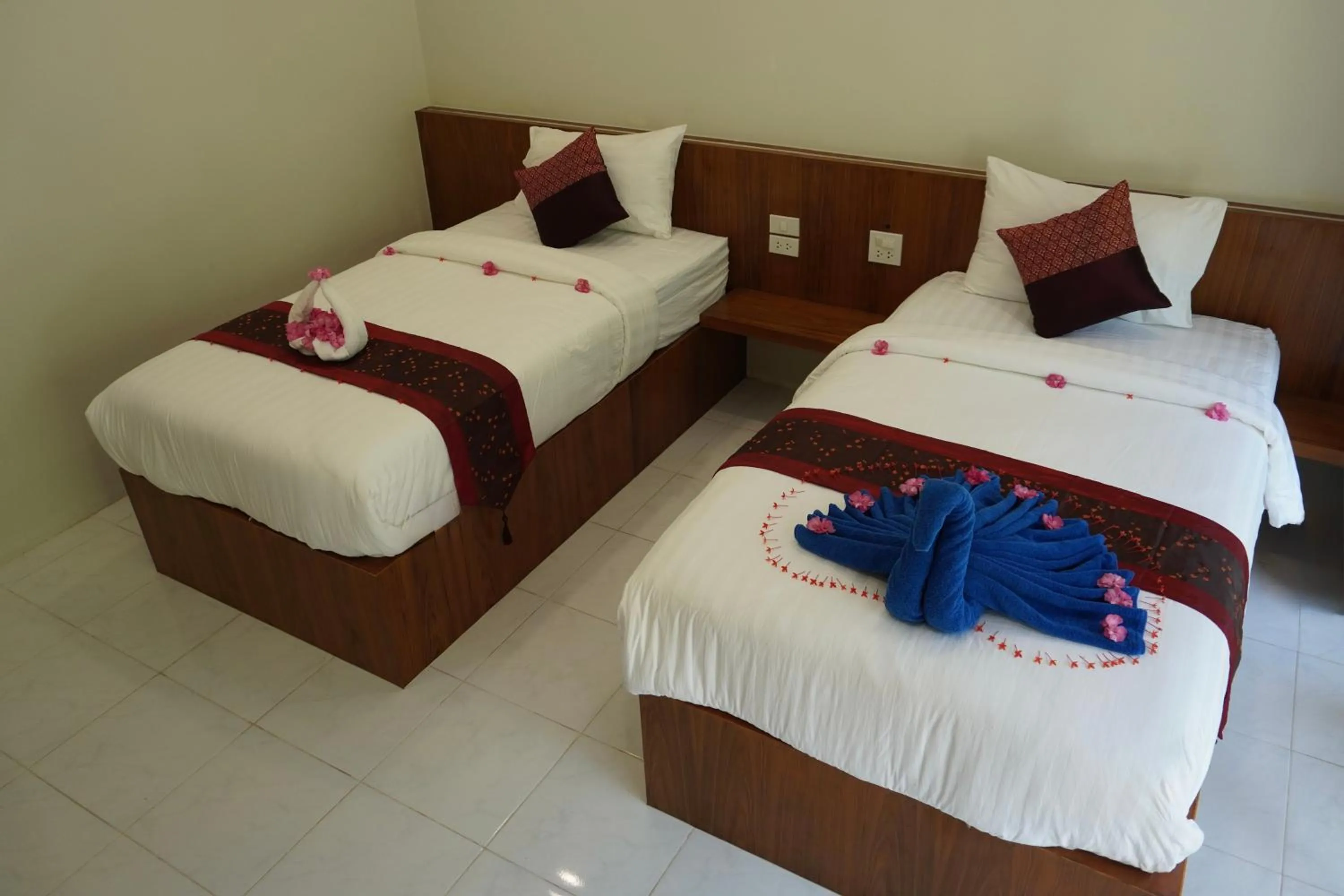 Bed in JP Resort Koh Tao