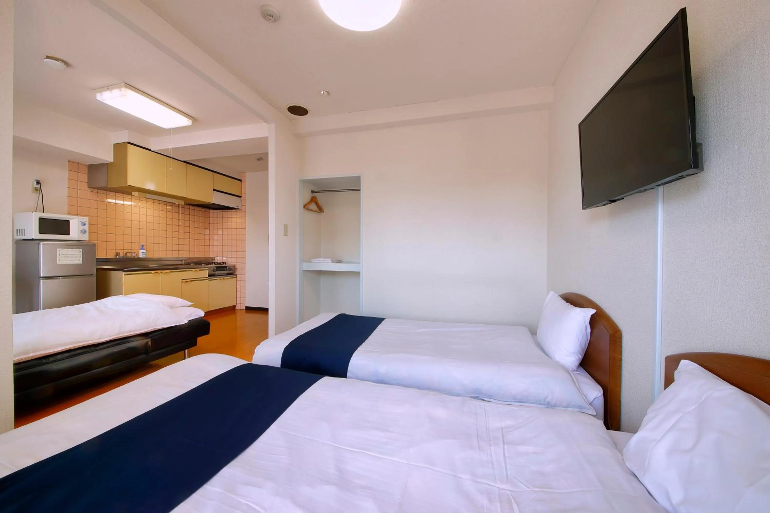 Photo of the whole room, Bed in HOTEL Nishikawaguchi Weekly