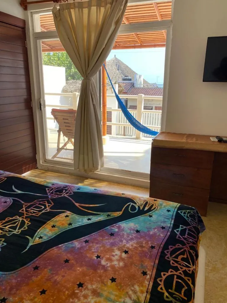 Bed in Casa de las Olas Surf & Beach Club