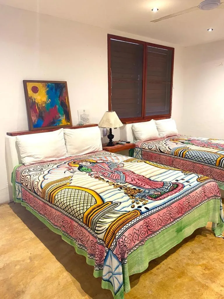 Bed in Casa de las Olas Surf & Beach Club