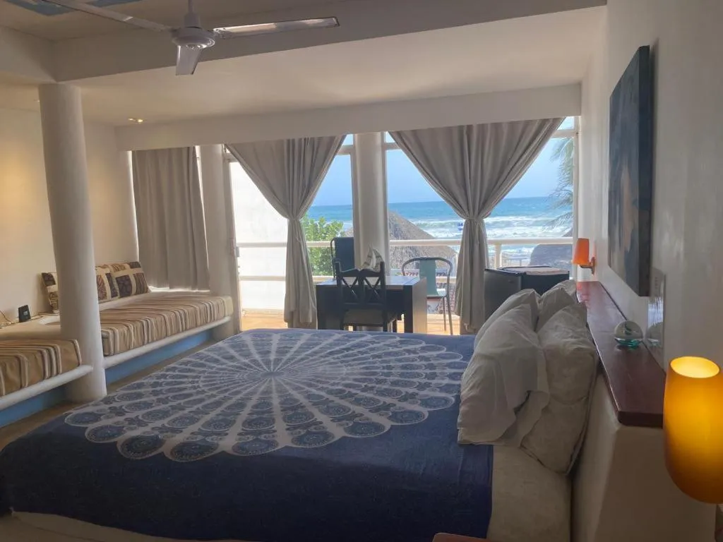 Bed in Casa de las Olas Surf & Beach Club