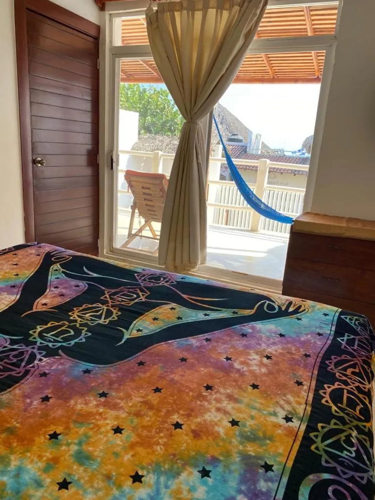 Bed in Casa de las Olas Surf & Beach Club