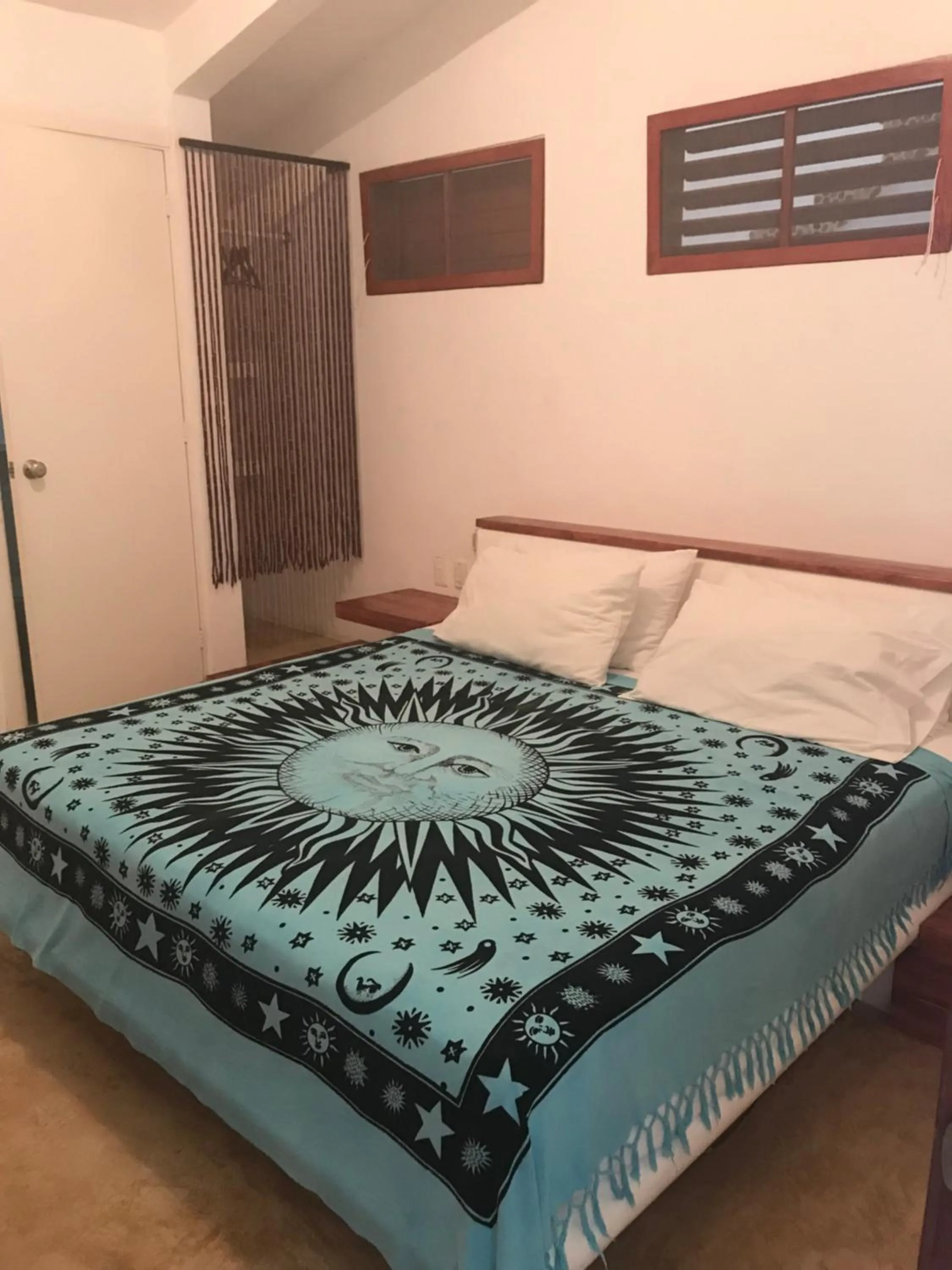 Bed in Casa de las Olas Surf & Beach Club