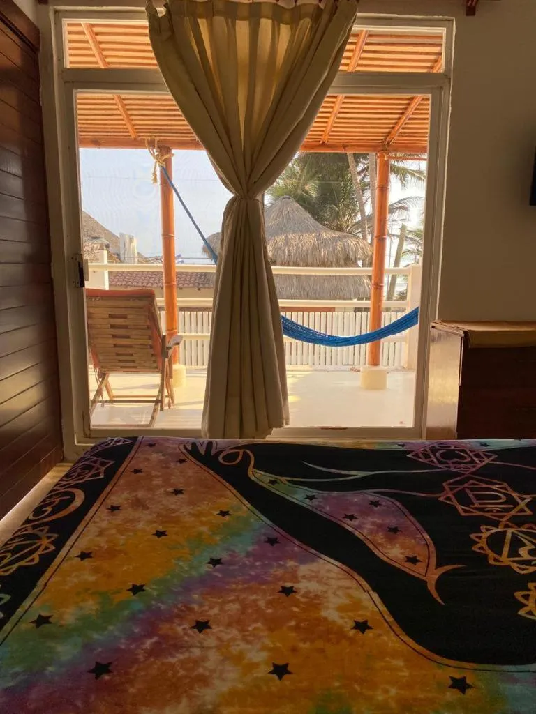 Bed in Casa de las Olas Surf & Beach Club