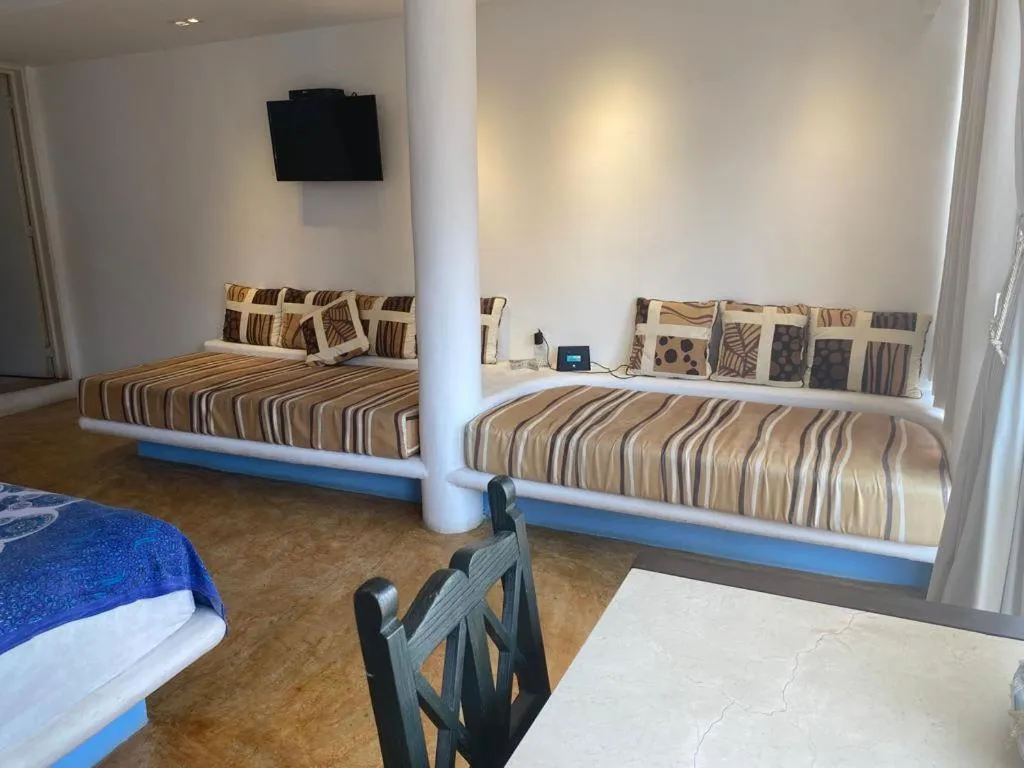 Bed in Casa de las Olas Surf & Beach Club