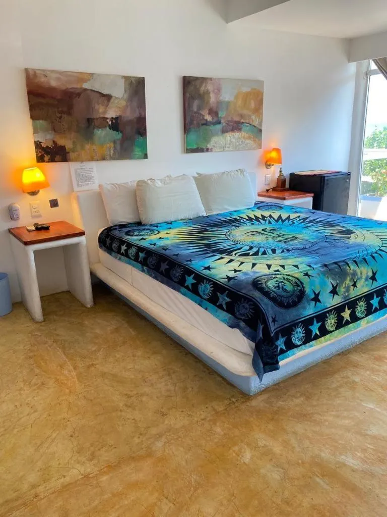 Bed in Casa de las Olas Surf & Beach Club