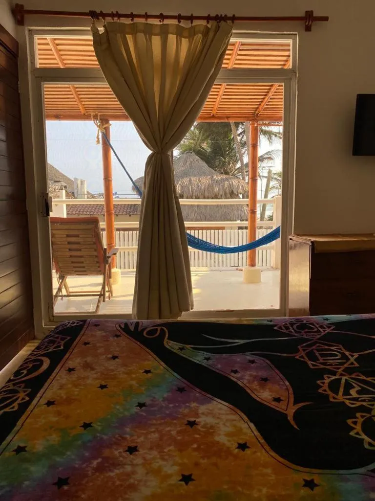 Bed in Casa de las Olas Surf & Beach Club