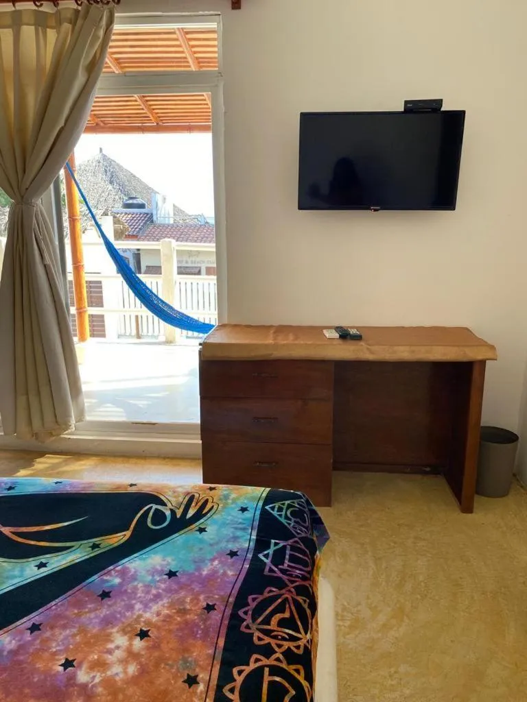 Bed in Casa de las Olas Surf & Beach Club