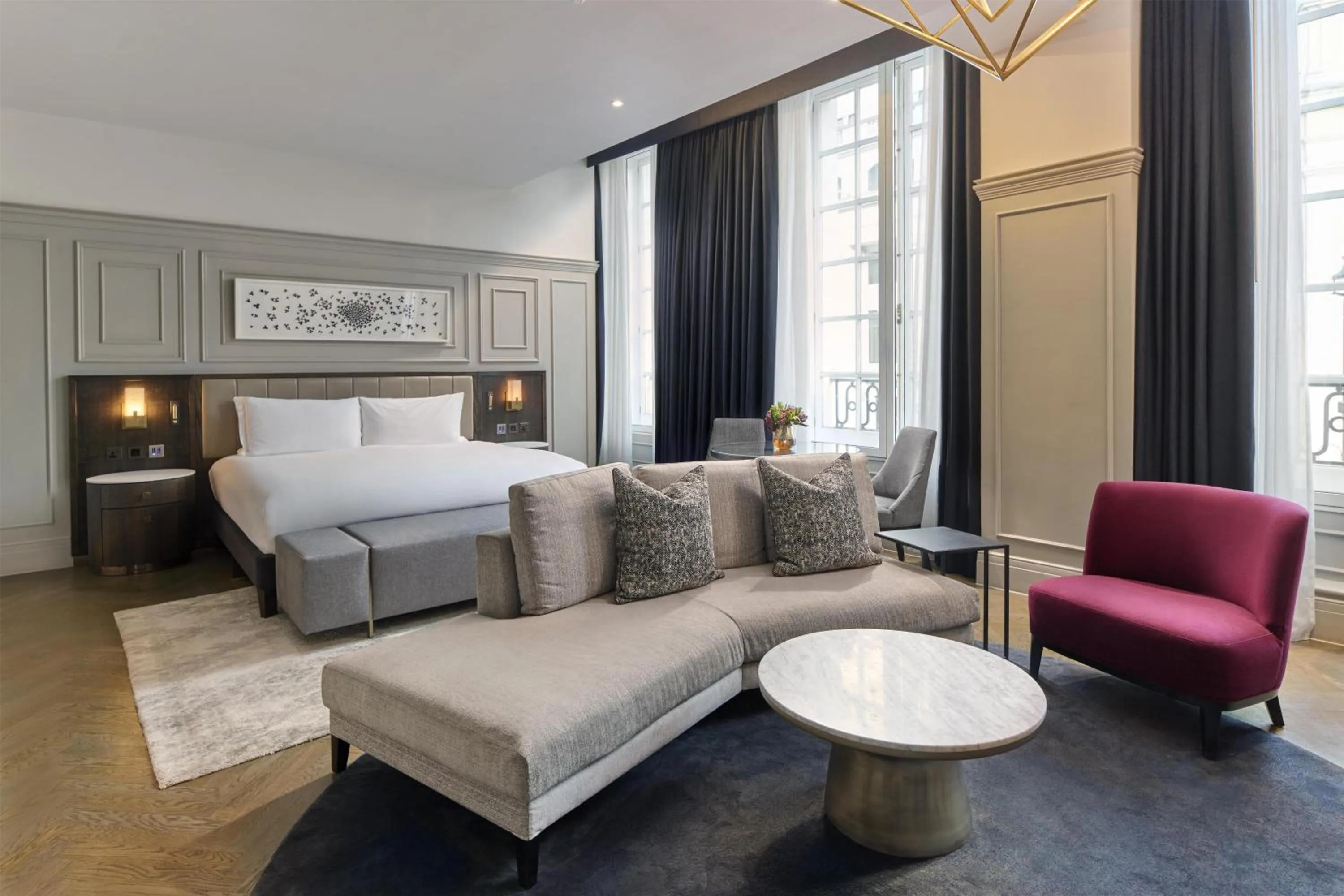 Living room, Bed in The Trafalgar St James London Curio Collection by Hilton