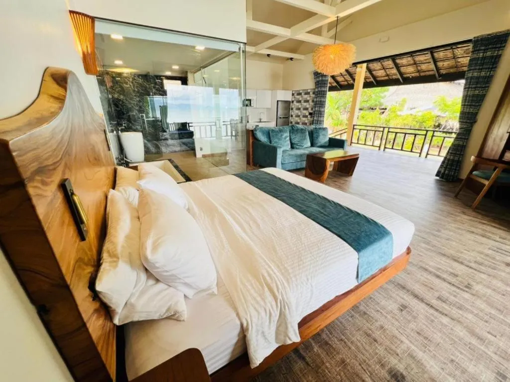 Photo of the whole room, Bed in Absolute Beachfront Resort