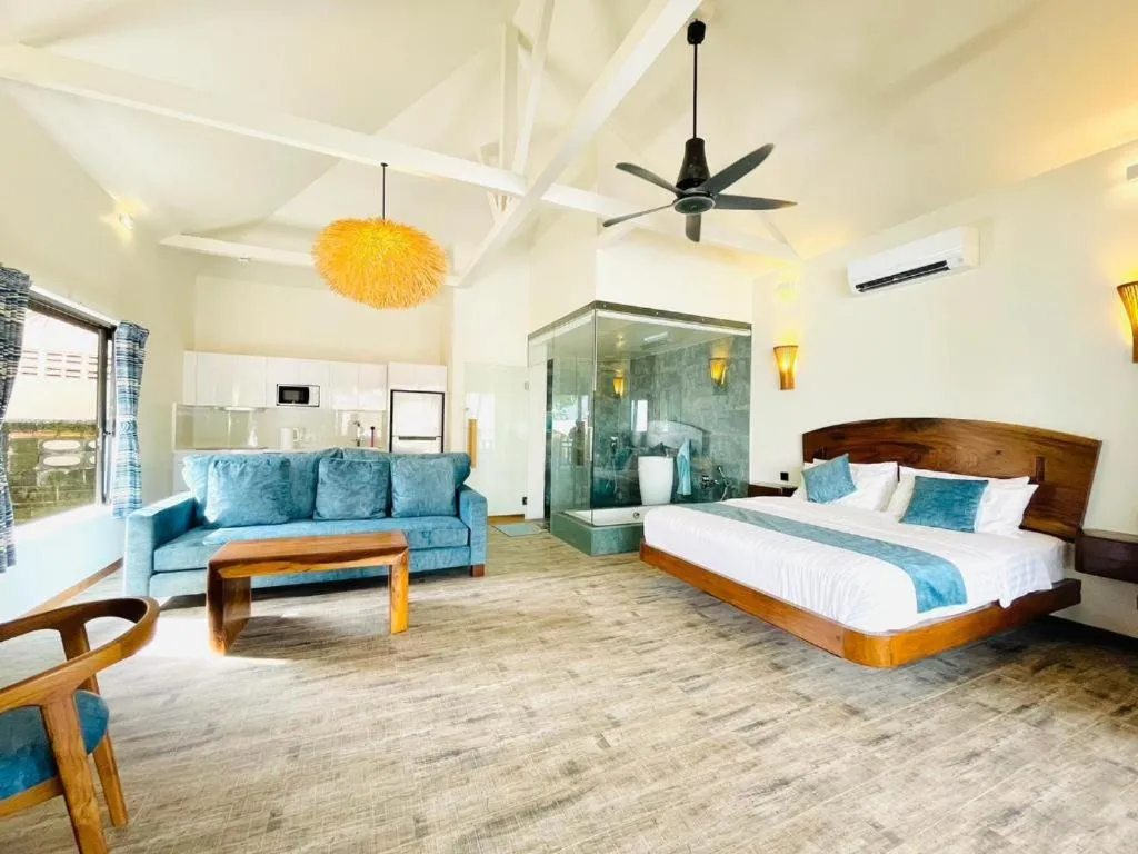 Photo of the whole room, Bed in Absolute Beachfront Resort