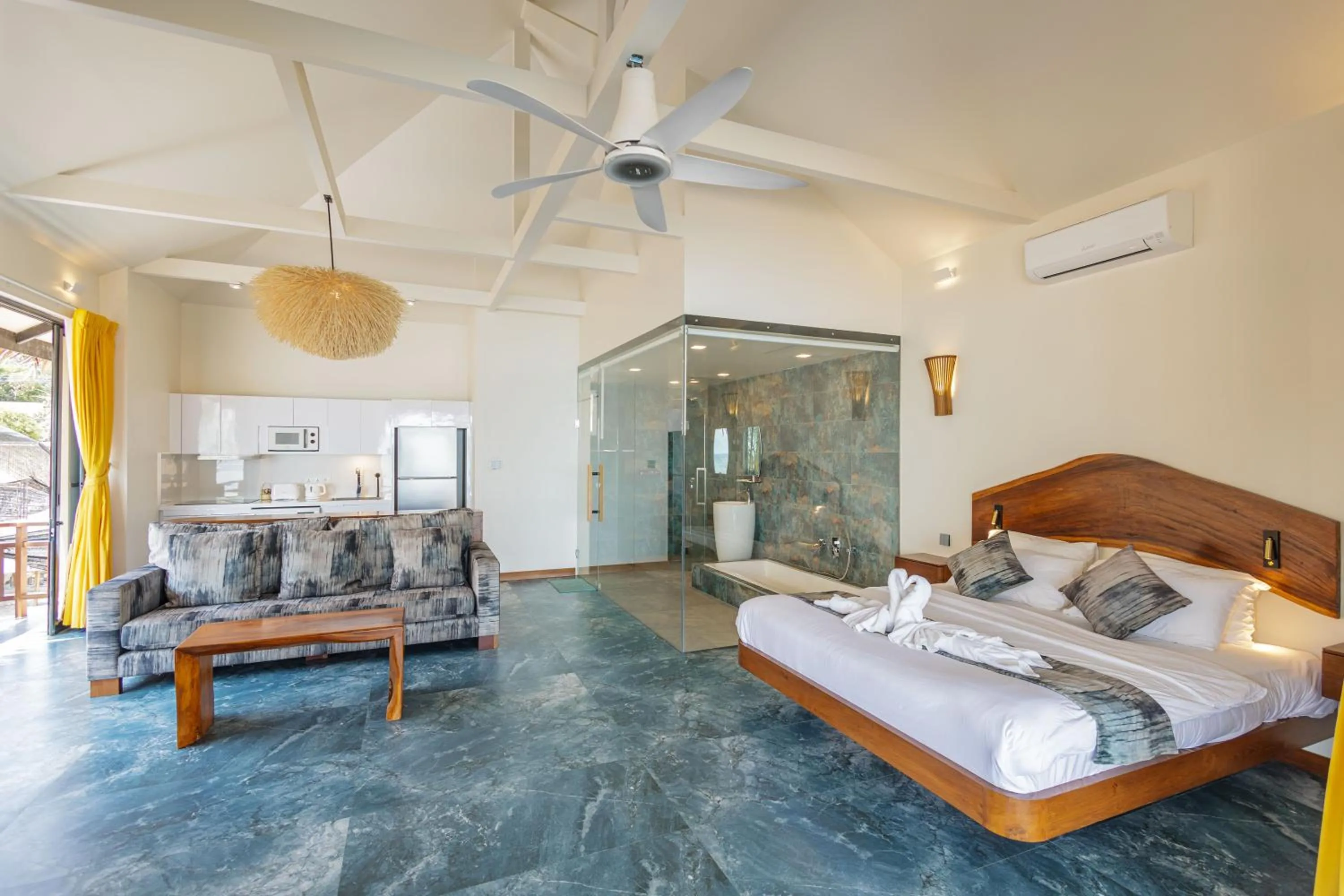 Bed in Absolute Beachfront Resort