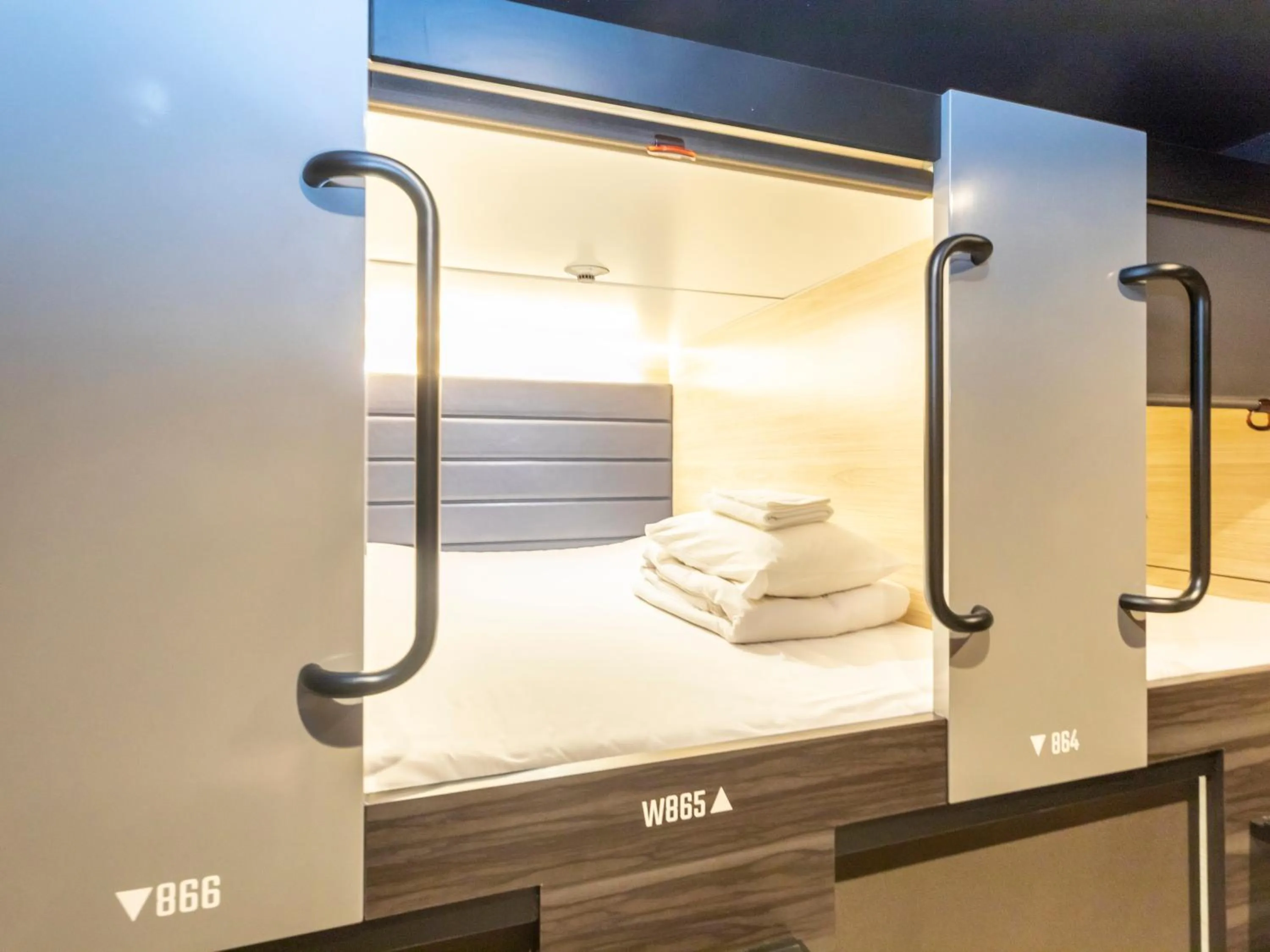 Photo of the whole room, Bed in Tabist CapsuleHotel APODS Himeji Station