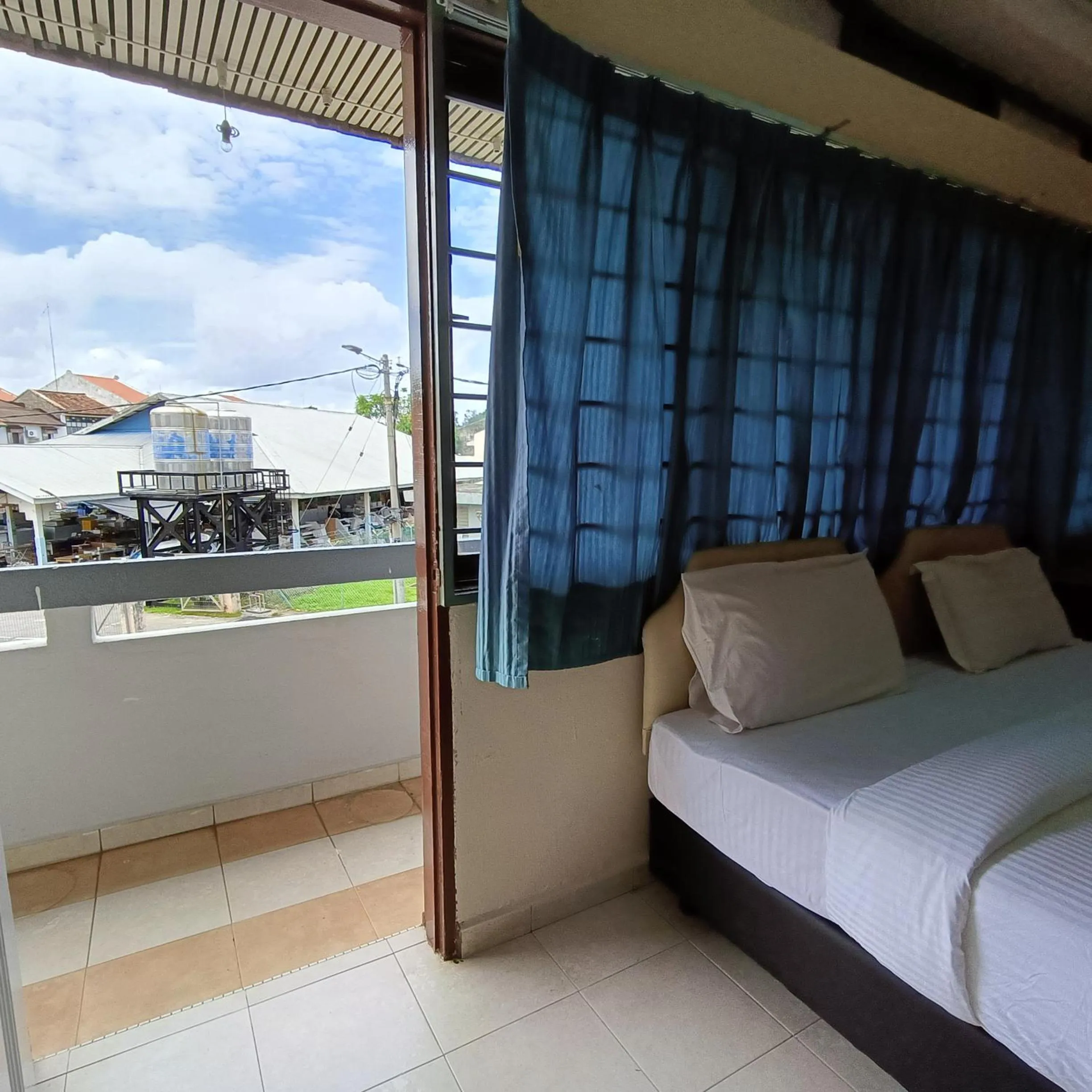 View (from property/room), Bed in Kota Lodge Guest House