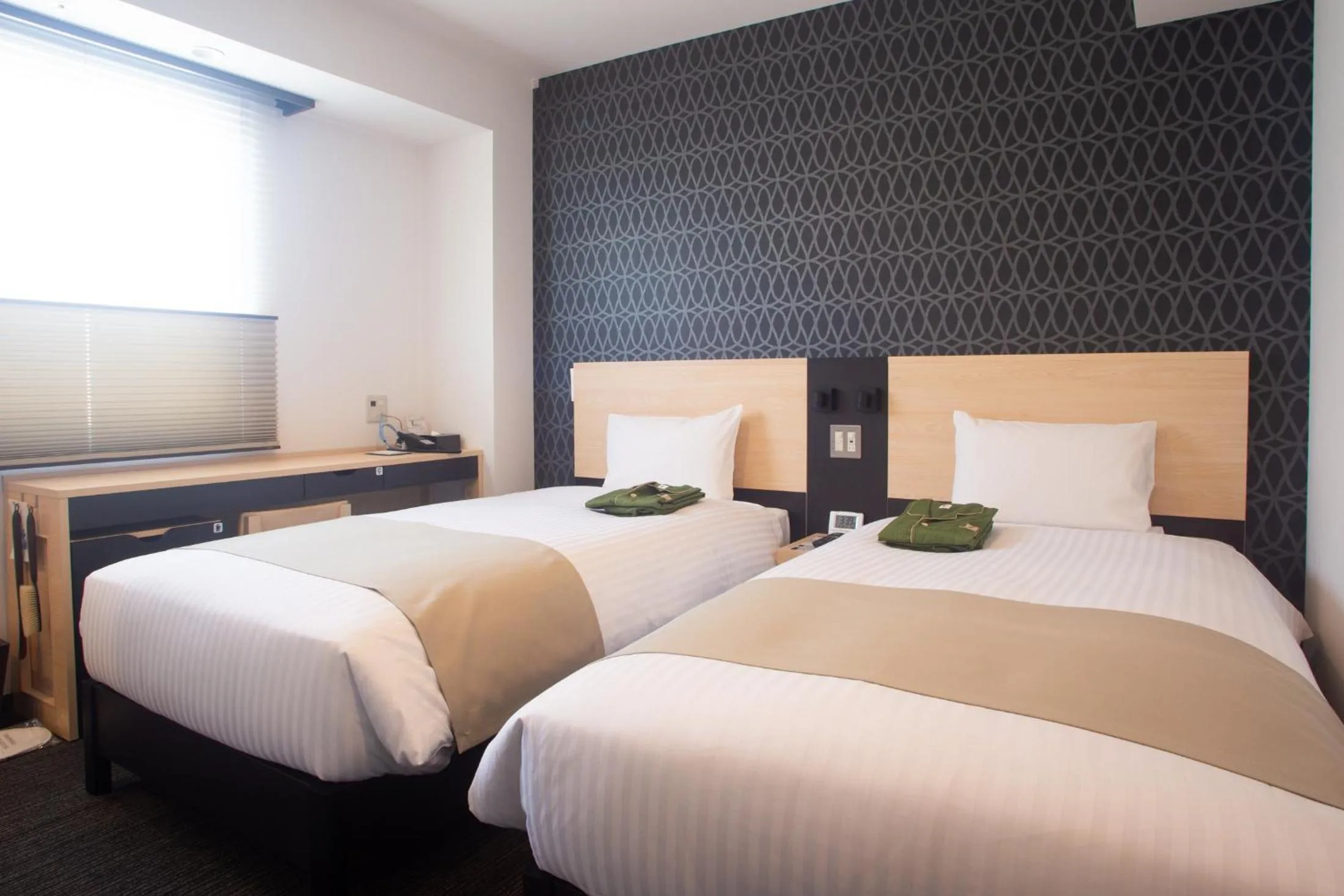 Bed in Hotel Kuretakeso Hiroshima Otemachi