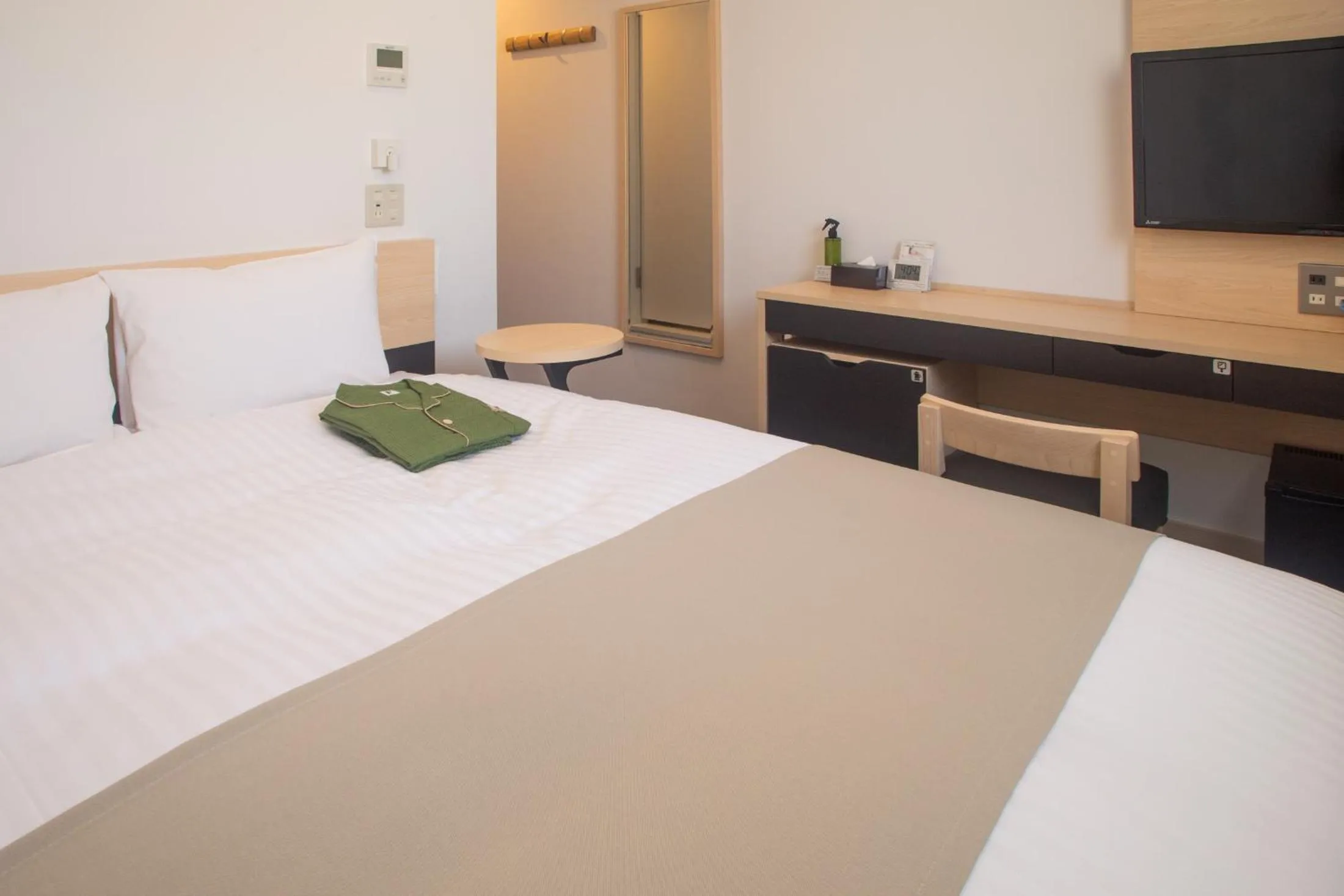 Bed in Hotel Kuretakeso Hiroshima Otemachi