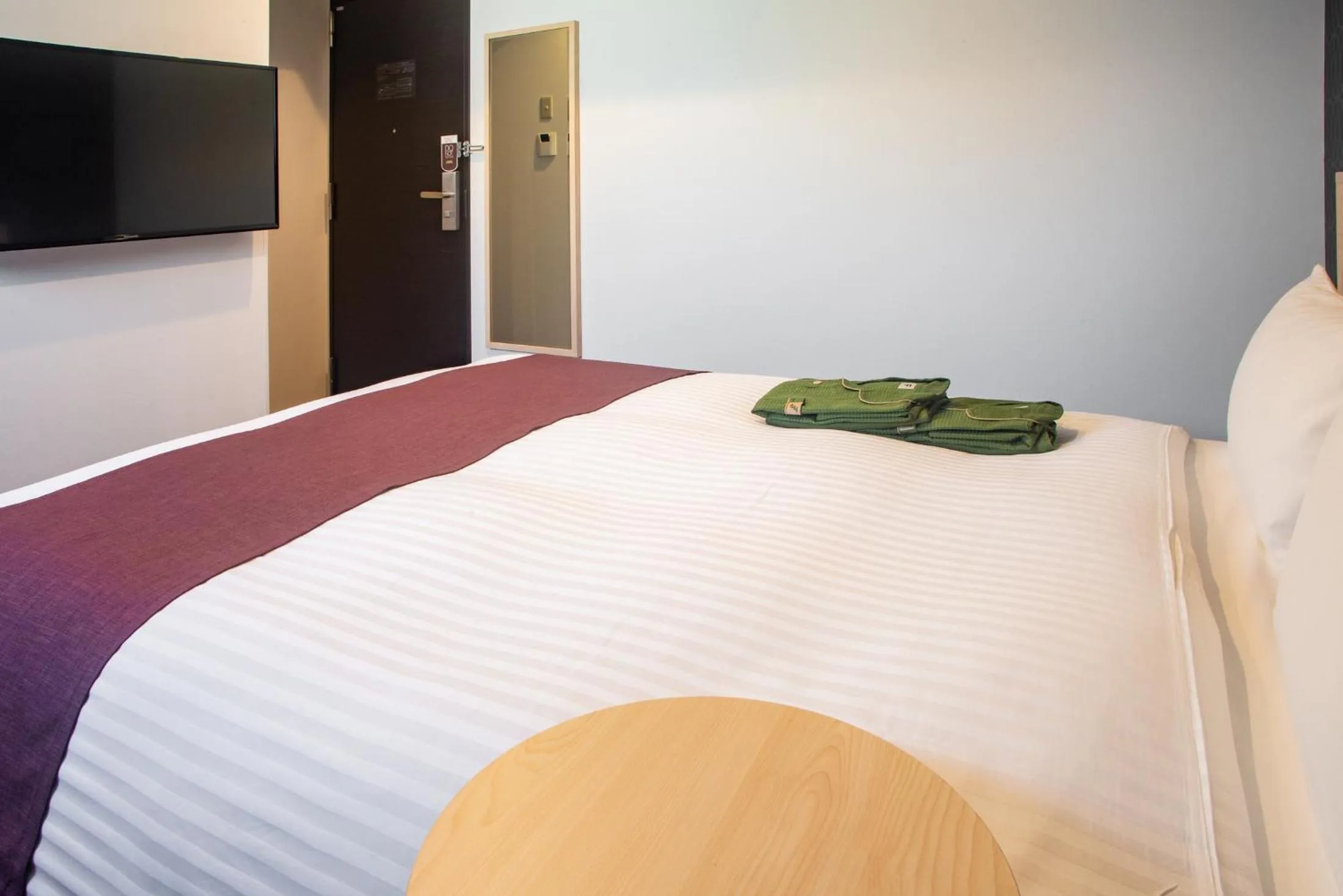 Bed in Hotel Kuretakeso Hiroshima Otemachi