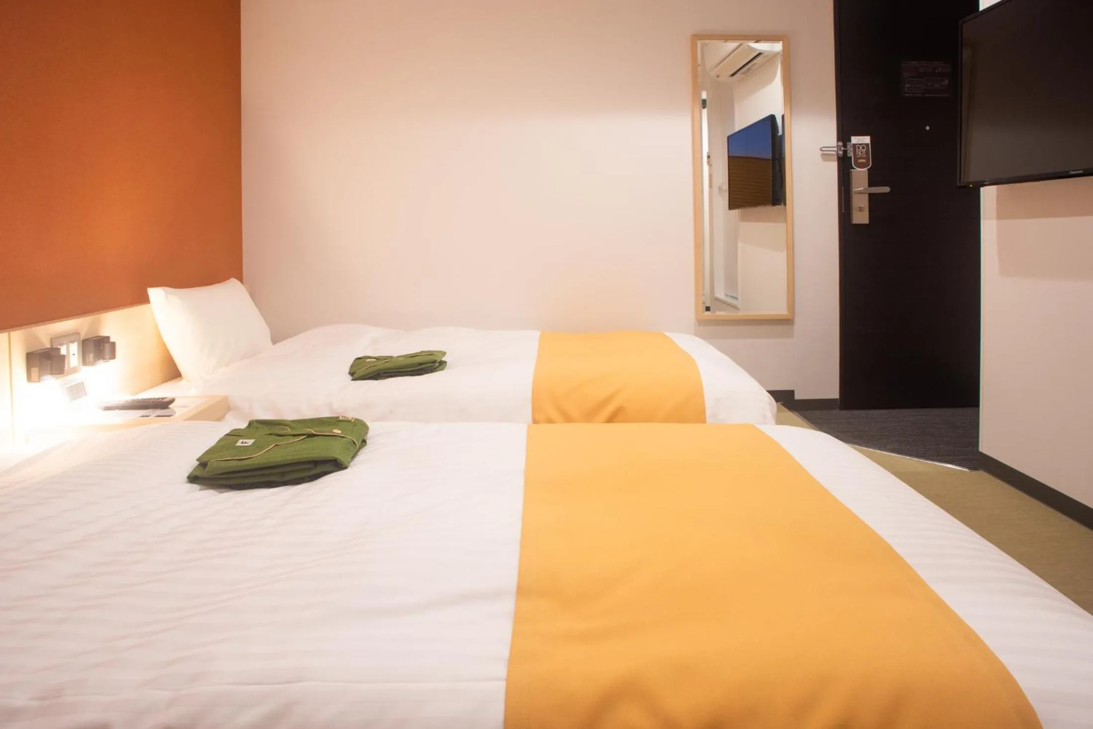 Bed in Hotel Kuretakeso Hiroshima Otemachi