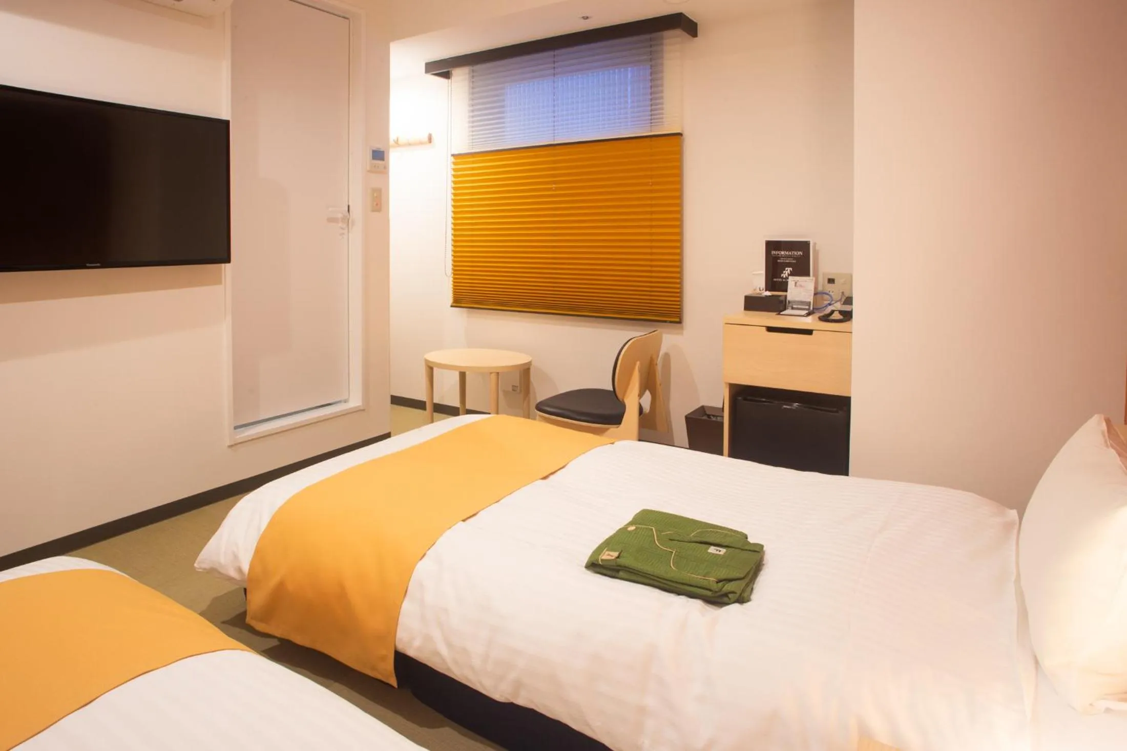 Bed in Hotel Kuretakeso Hiroshima Otemachi