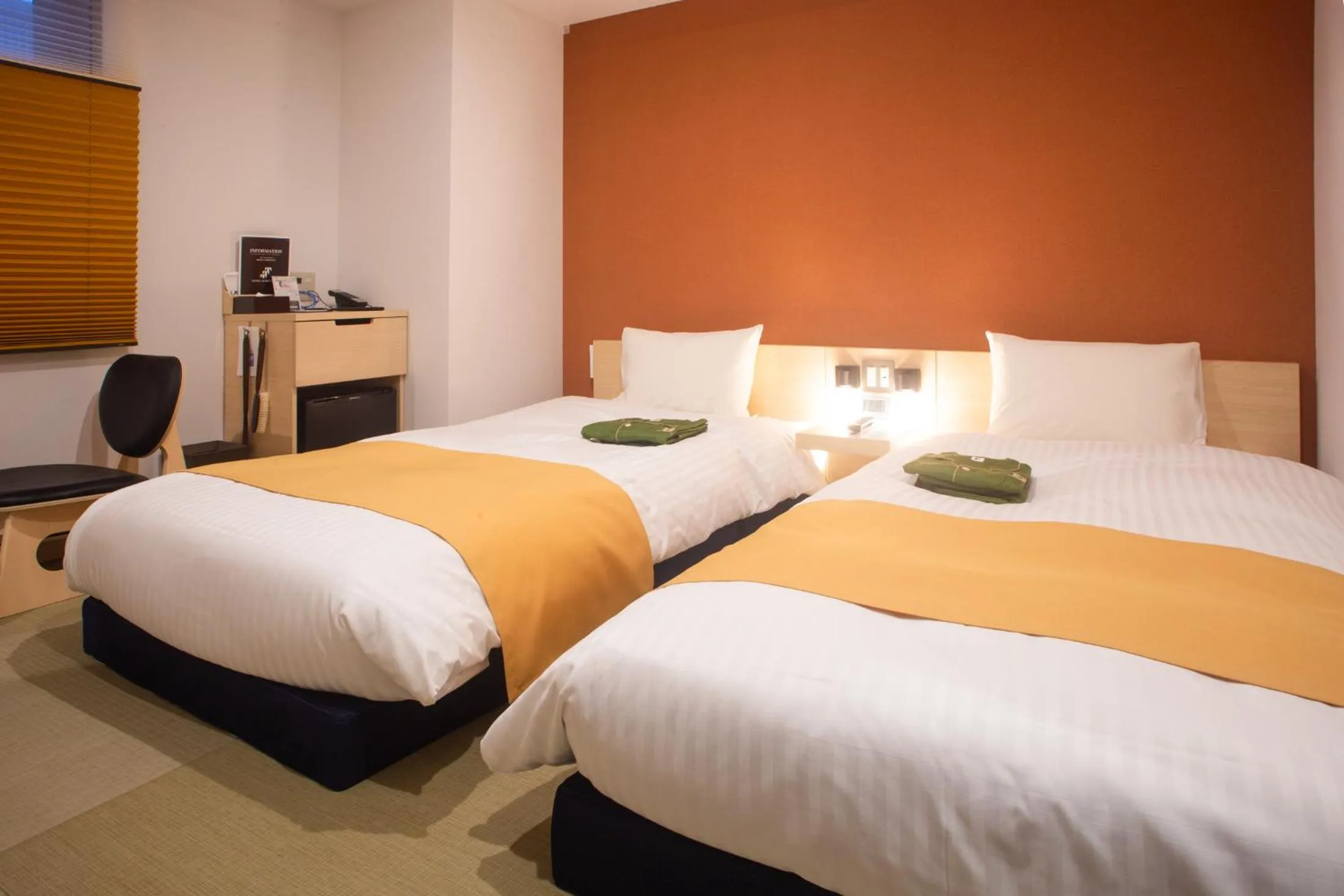 Bed in Hotel Kuretakeso Hiroshima Otemachi