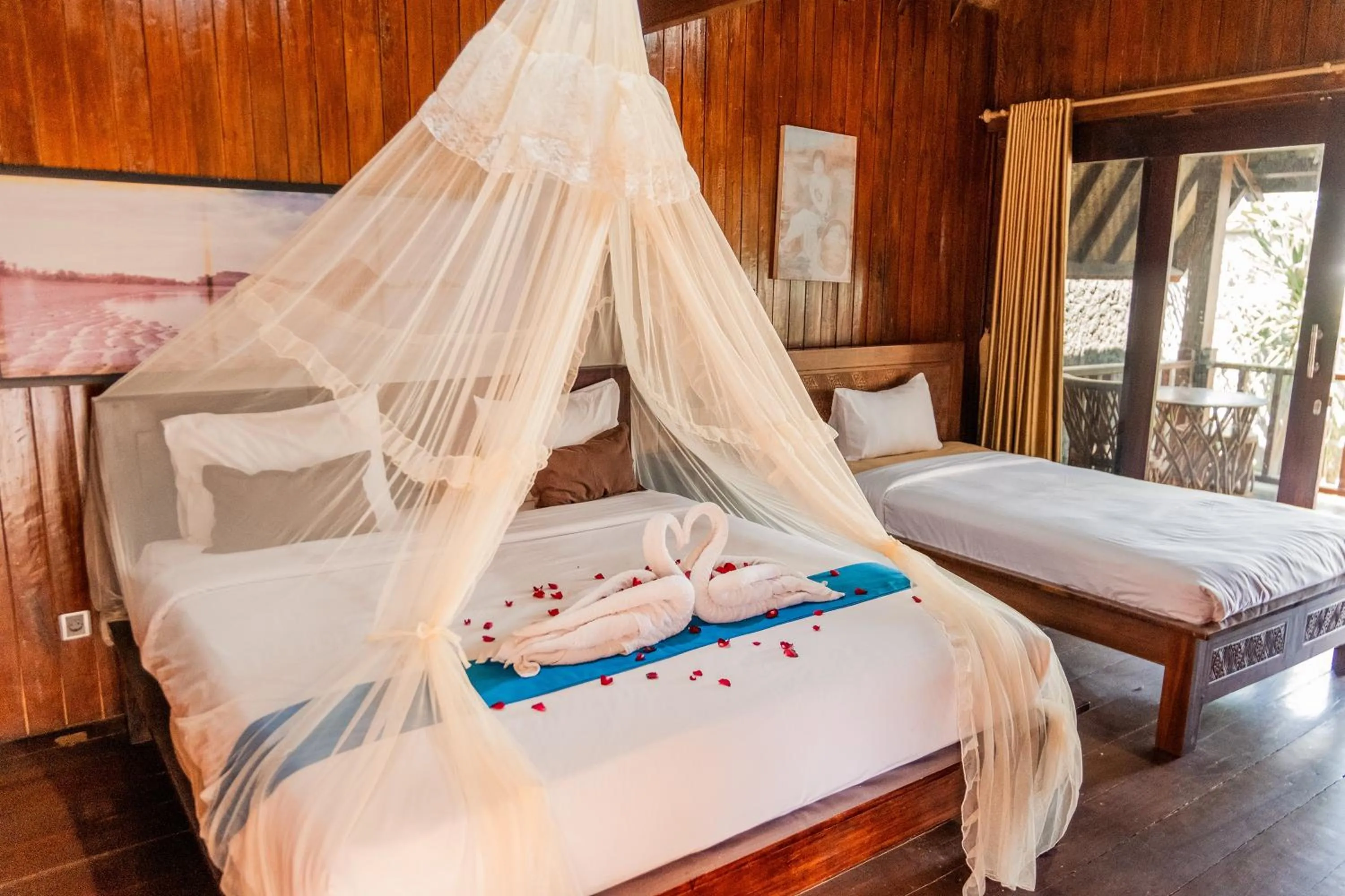 Bed in Yoki's Bungalows