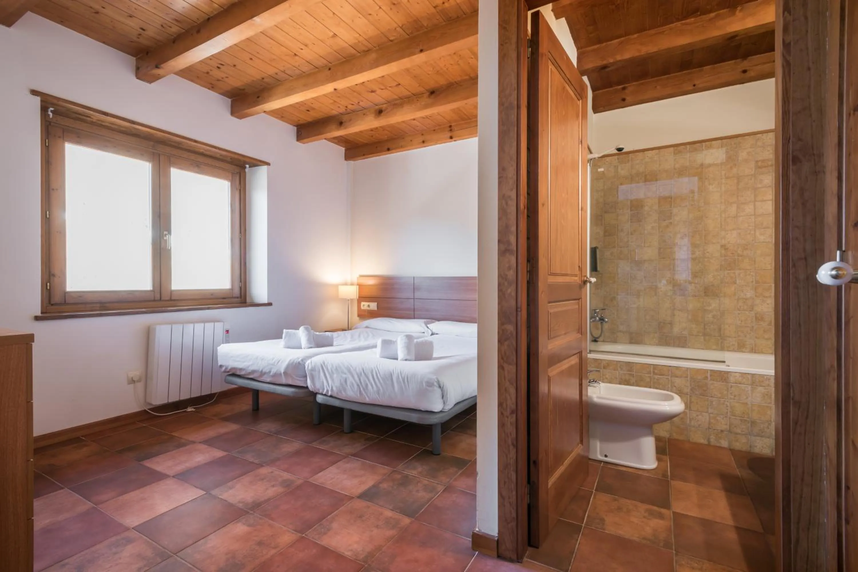 Bed in Apartamentos SNÖ Mont Romies Unhola