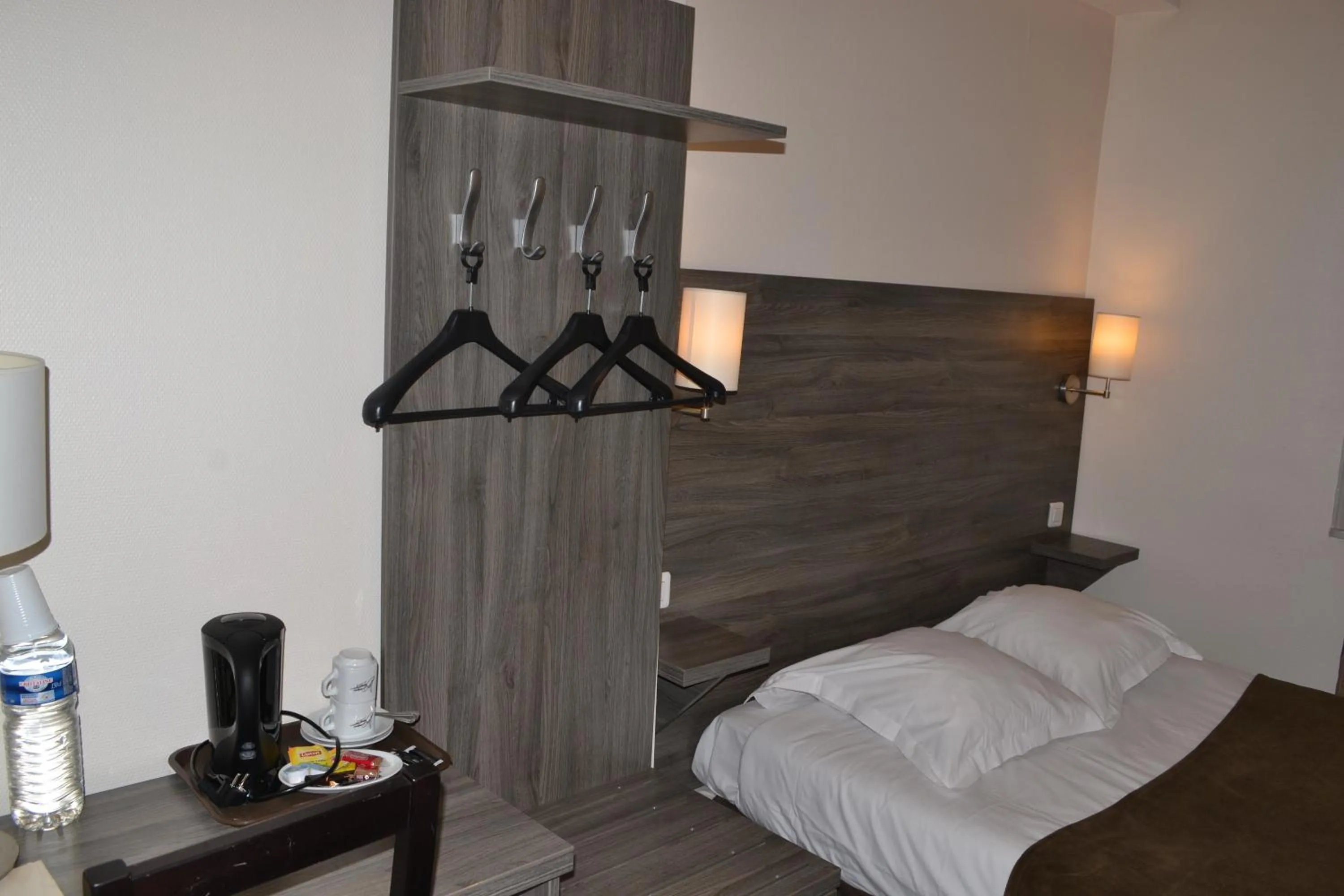 Coffee/tea facilities, Bed in Logis-Hôtel & Restaurant LE CARNOT