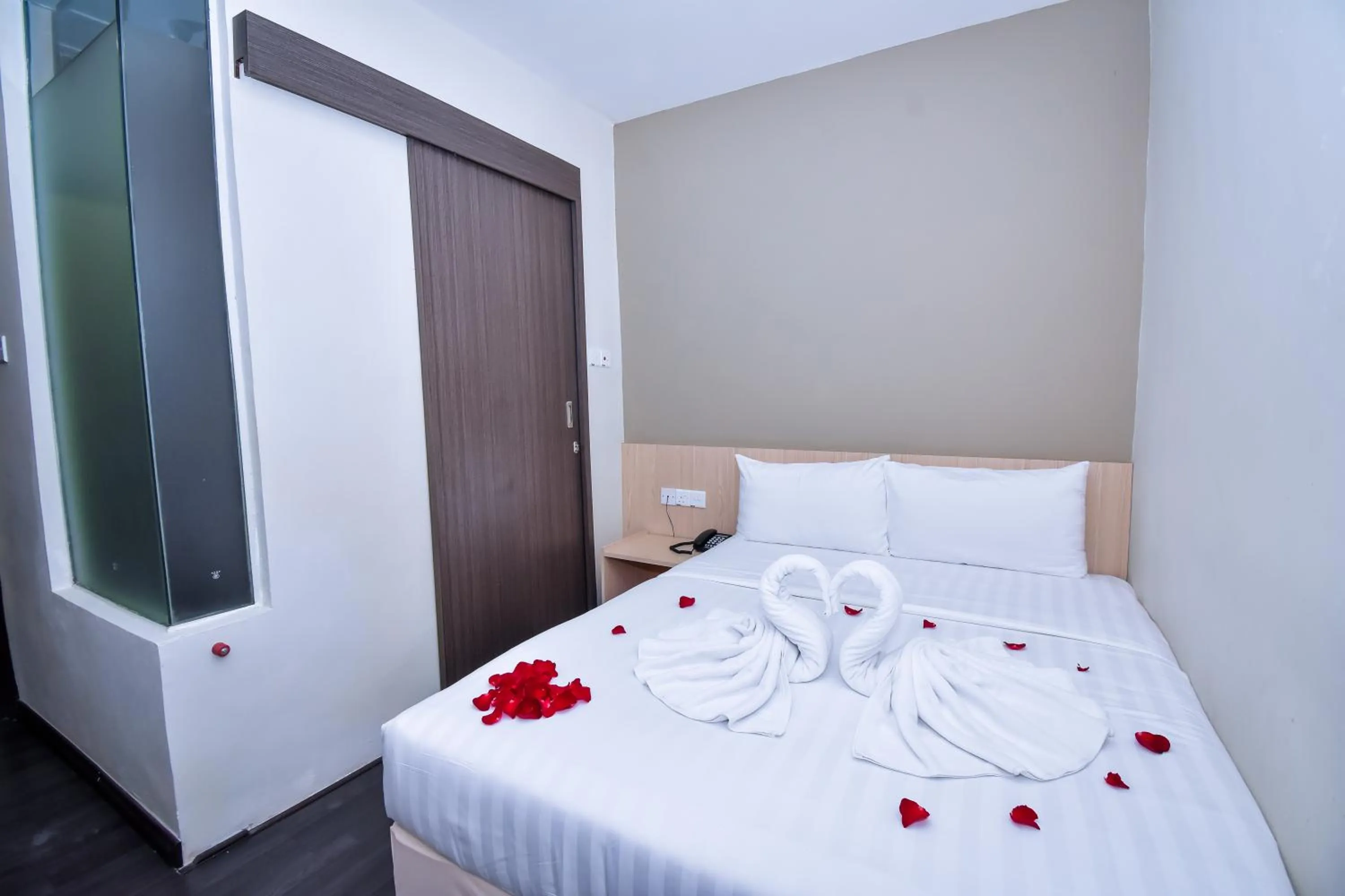 Bed in Eden Boutique Hotel