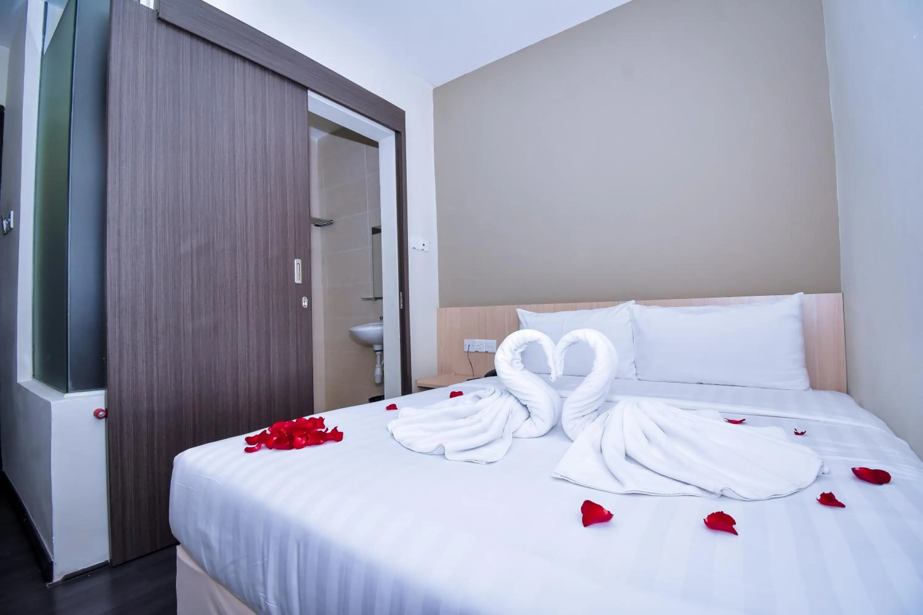 Bed in Eden Boutique Hotel